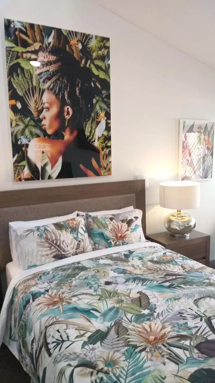 Bed in Private Suite Nautilus Beach Front Resort Bed in Private Suite Nautilus Beach Front Resort