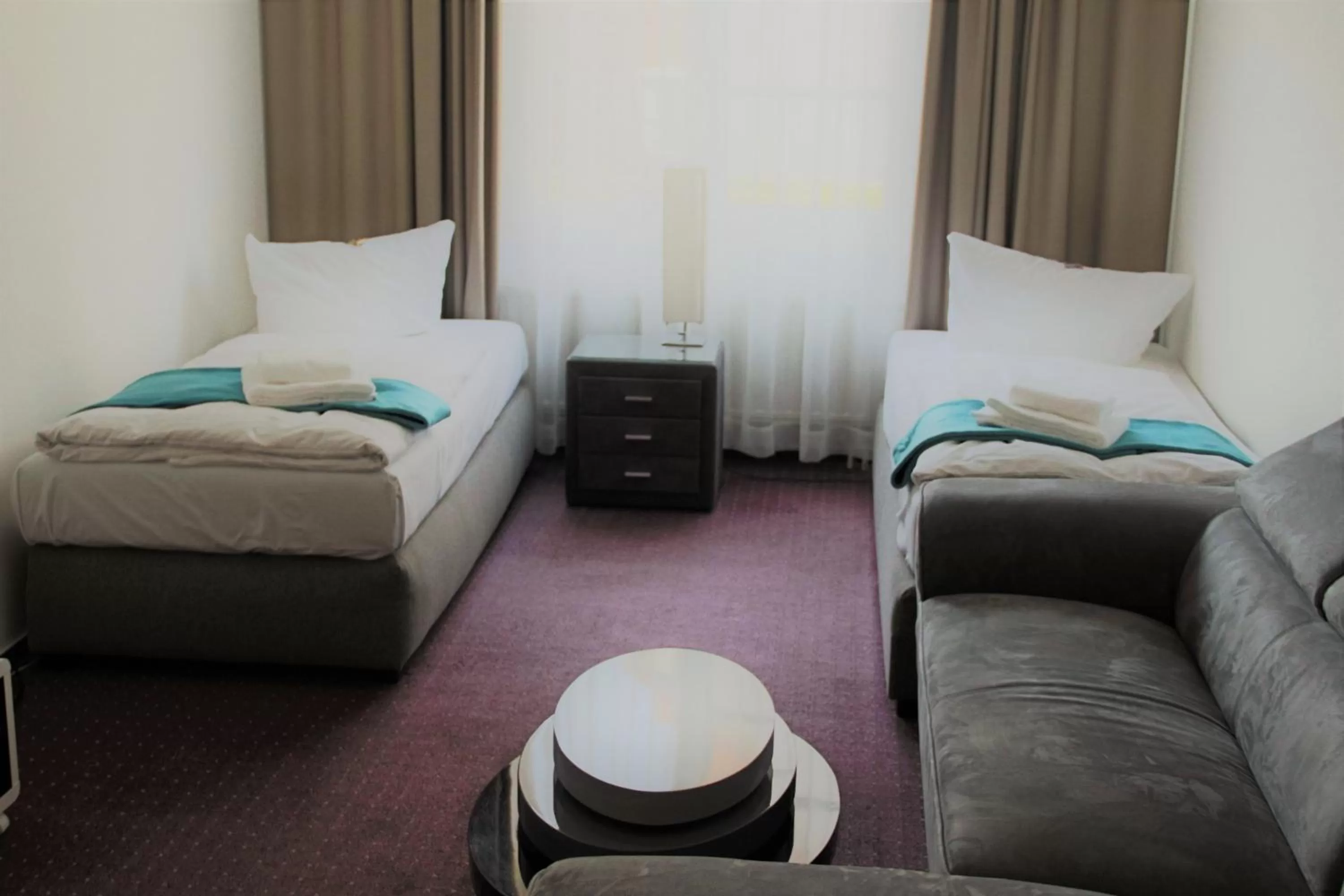 Photo of the whole room, Bed in Check Inn Hotel Merseburg