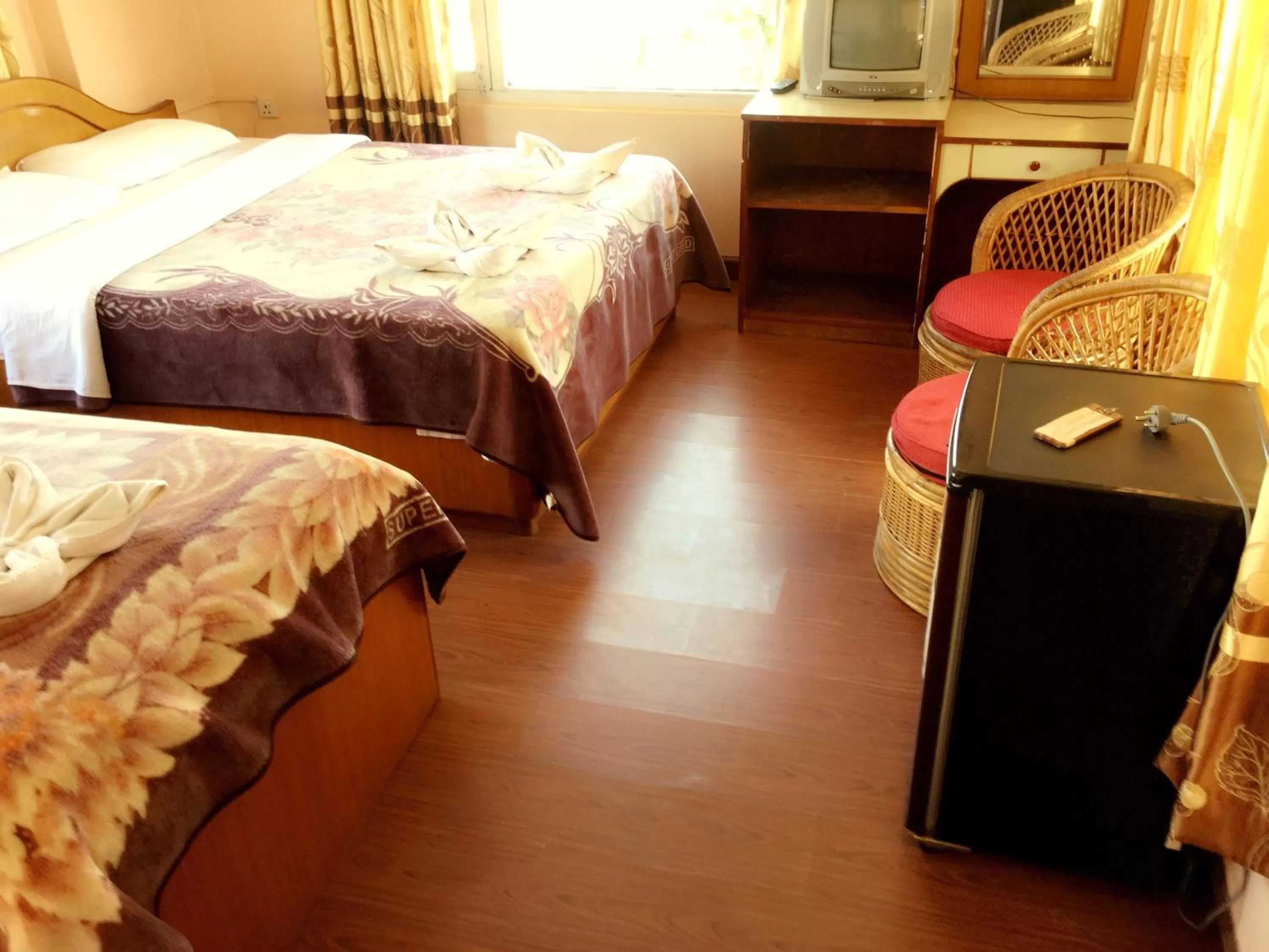 Bed in Hotel Himalayan Inn