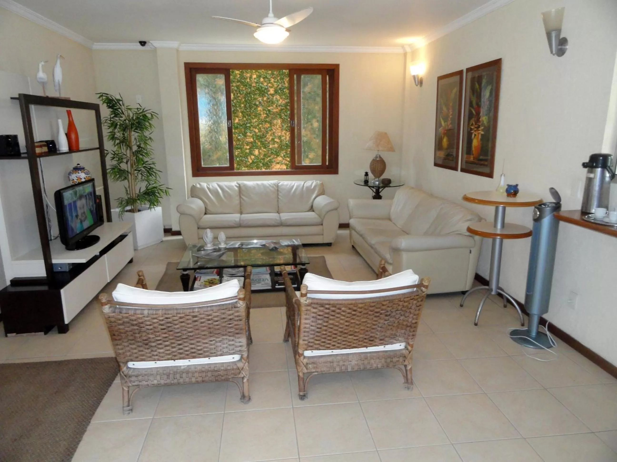 Communal lounge/ TV room, Seating Area in Village du Soleil