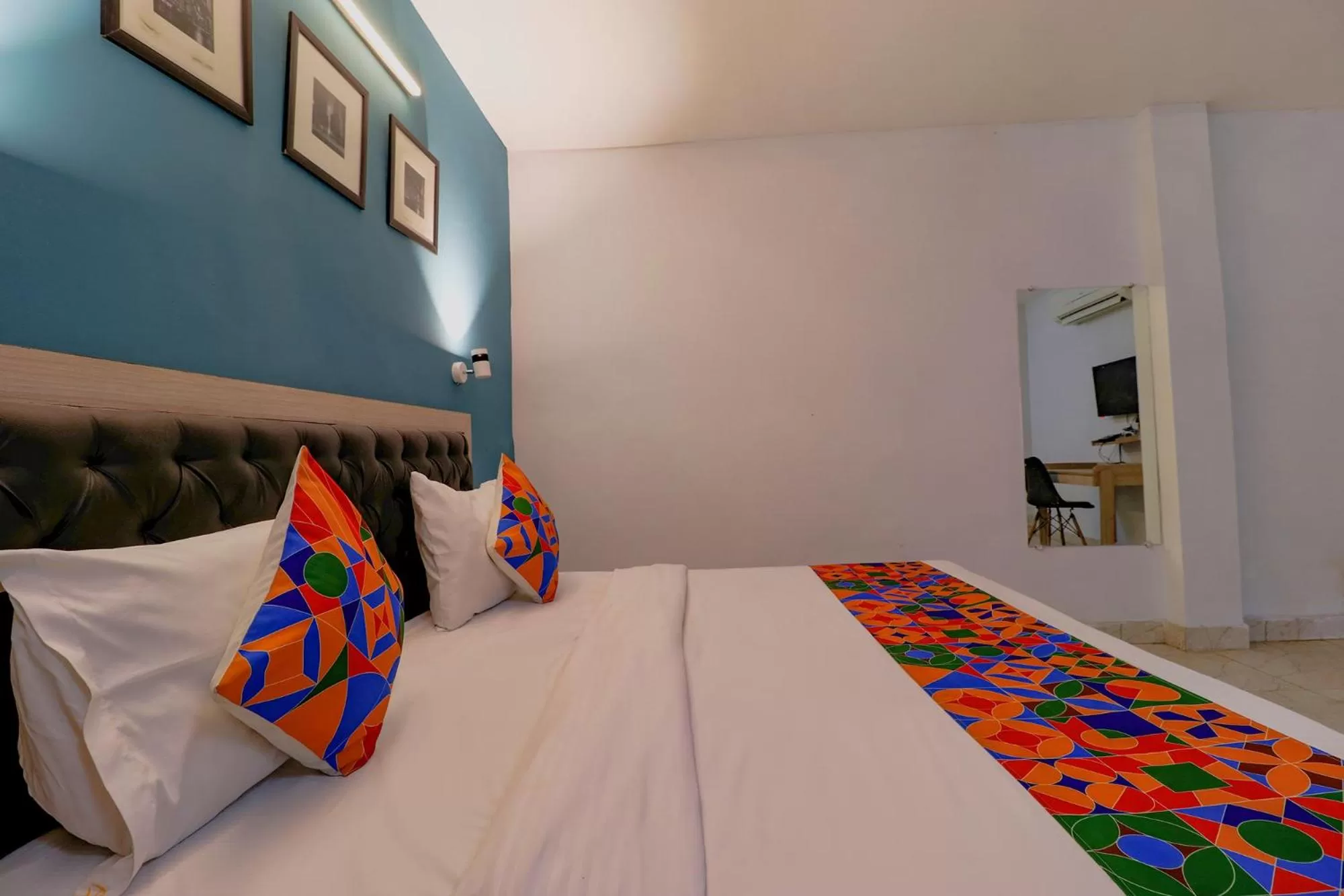 Bed in FabHotel Happy Inn