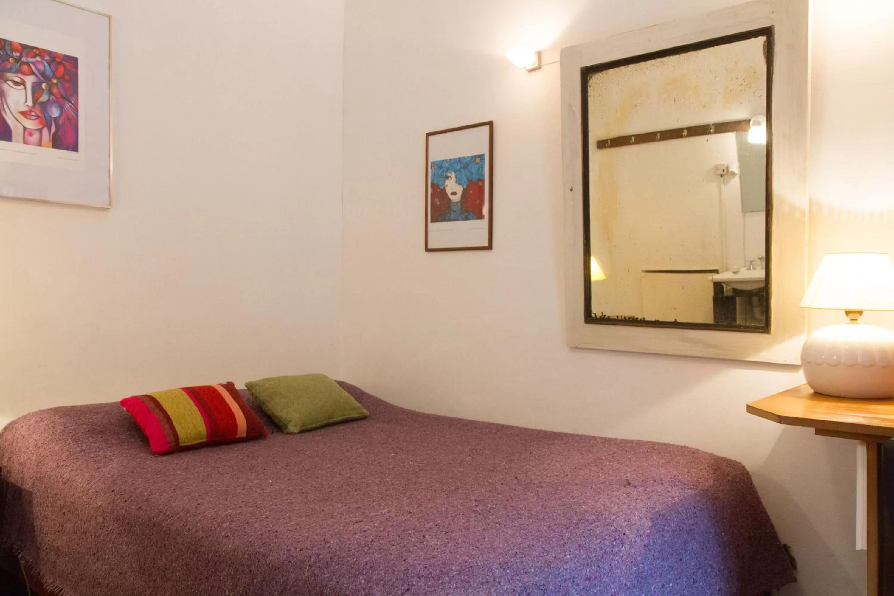 Bed in Lina's Tango Guesthouse