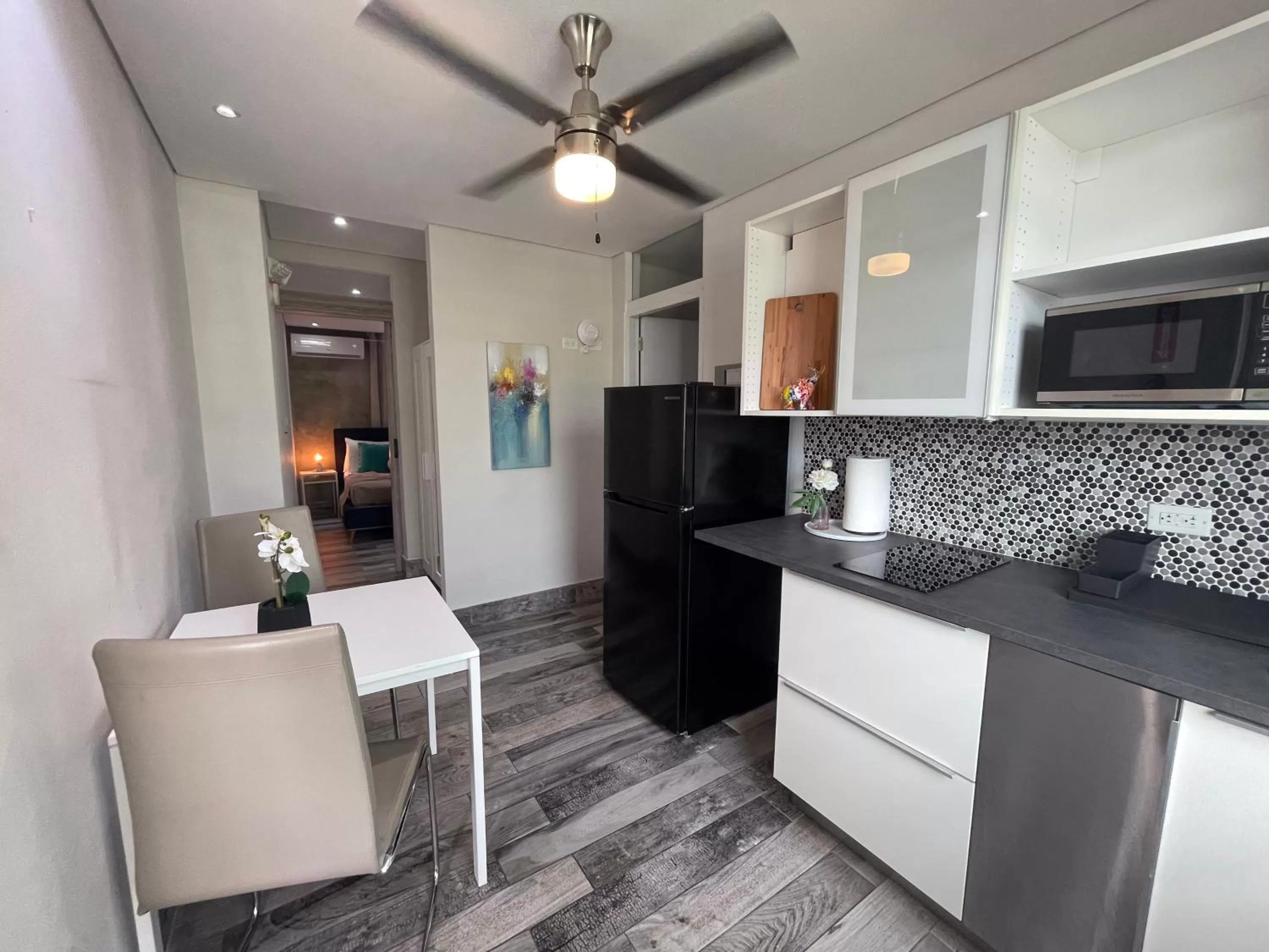 Kitchen or kitchenette, Bathroom in Rosalina Urbano