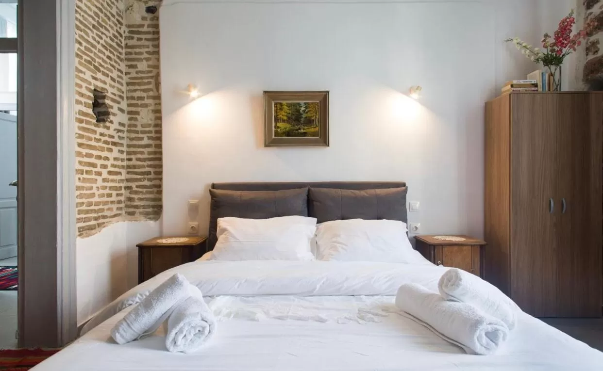 Bed in A litte Taste of Home Guest House