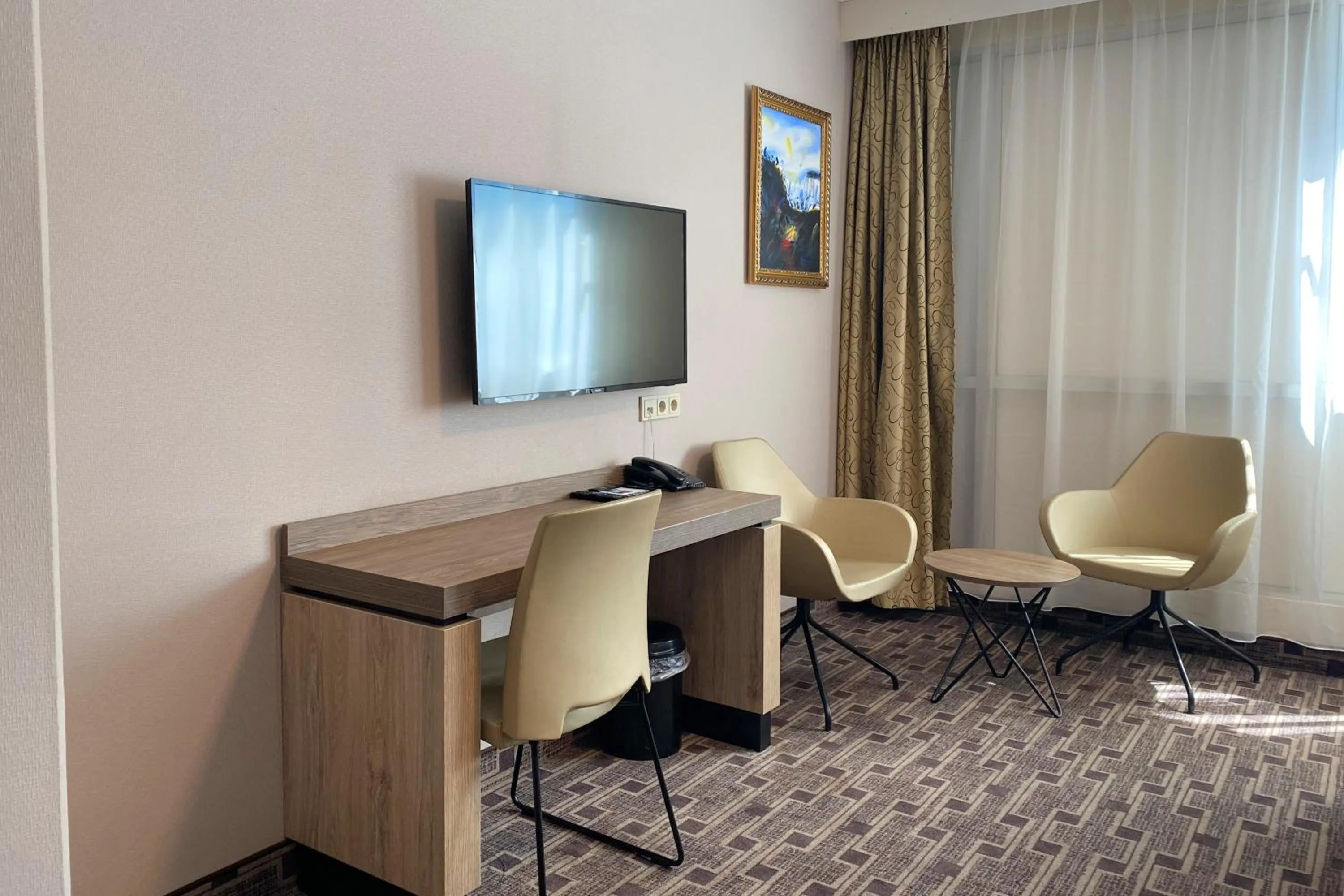 Seating area in XO Hotels Blue Square