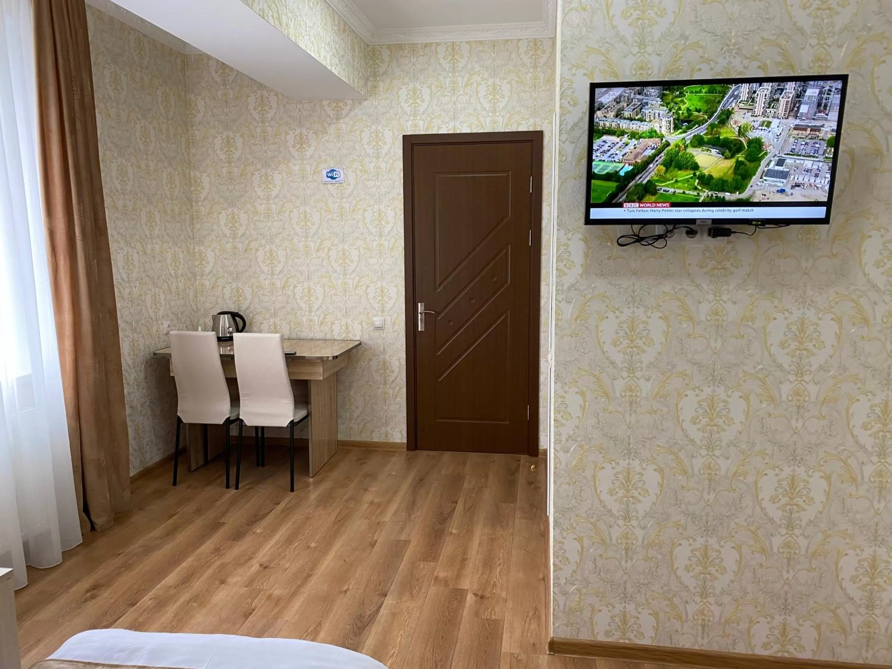 TV/Entertainment Center in Hotel Sharl