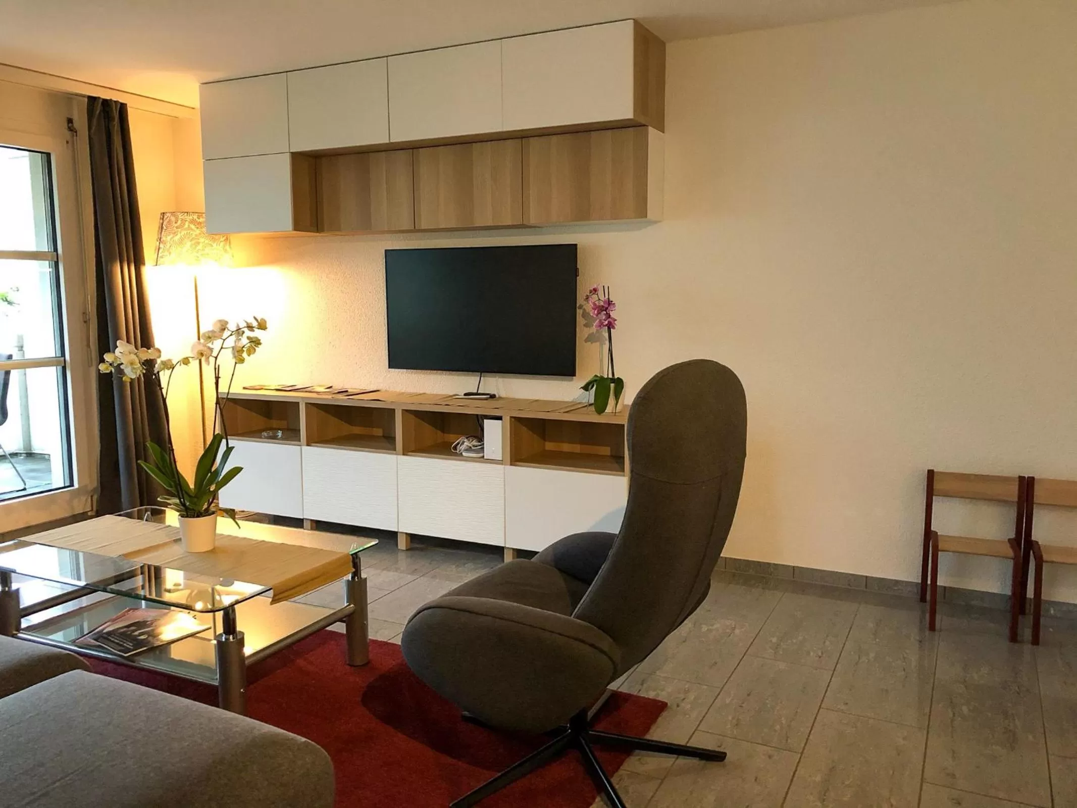 Communal lounge/ TV room in Seehotel Riviera at Lake Lucerne