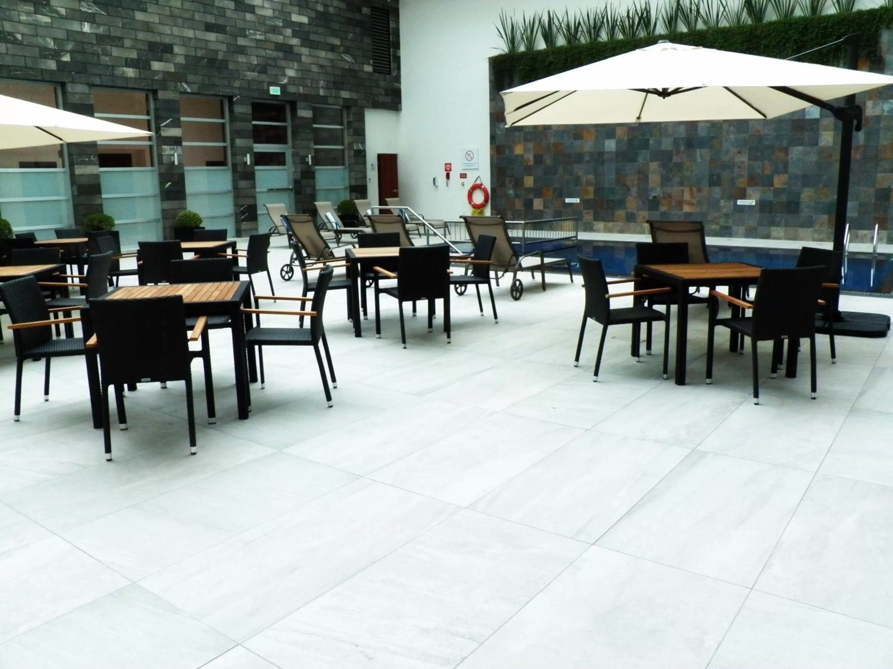 Swimming pool in Holiday Inn & Suites Plaza Mayor by IHG