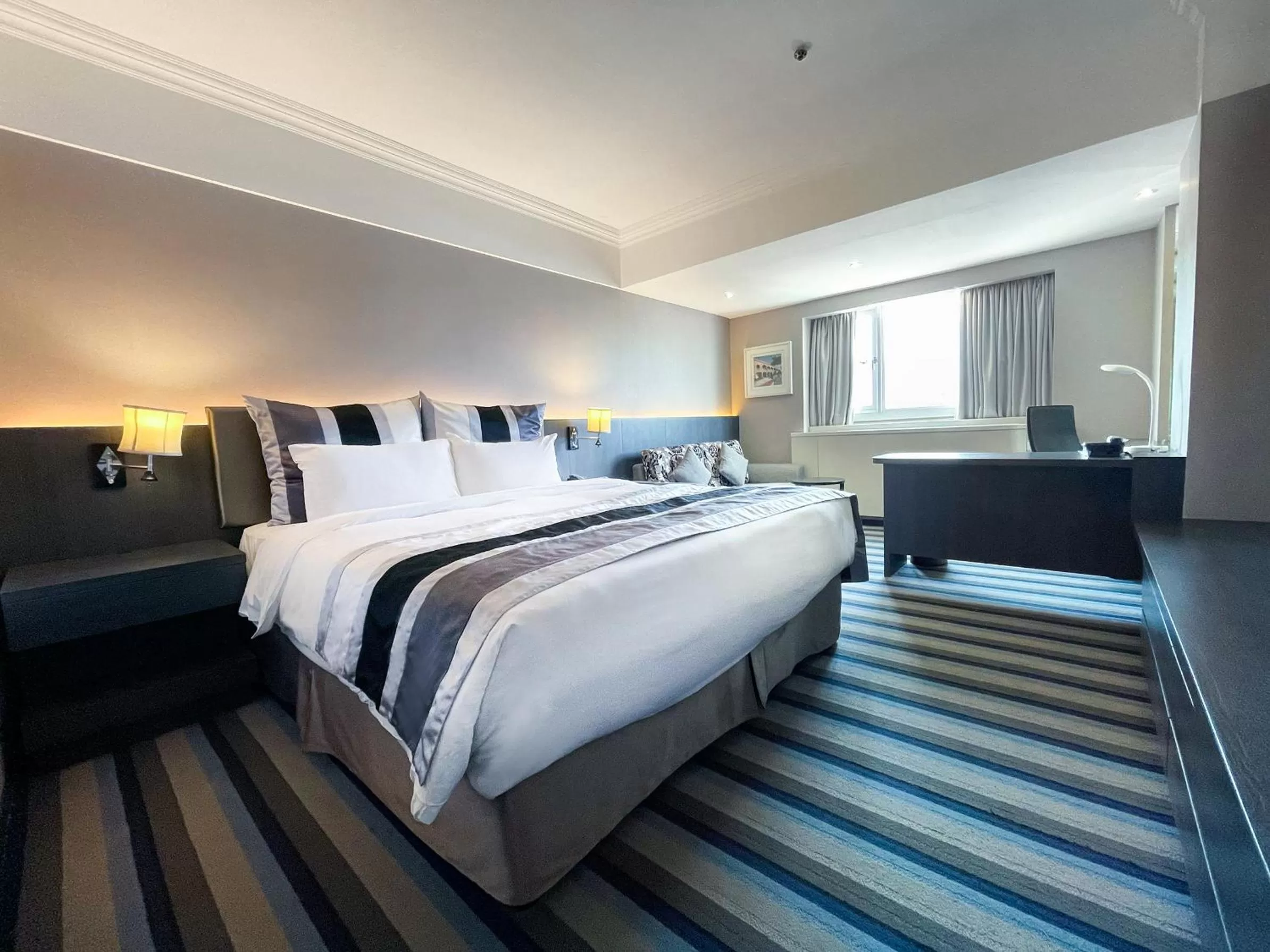 Bed in Guide Hotel Kaohsiung Liuhe