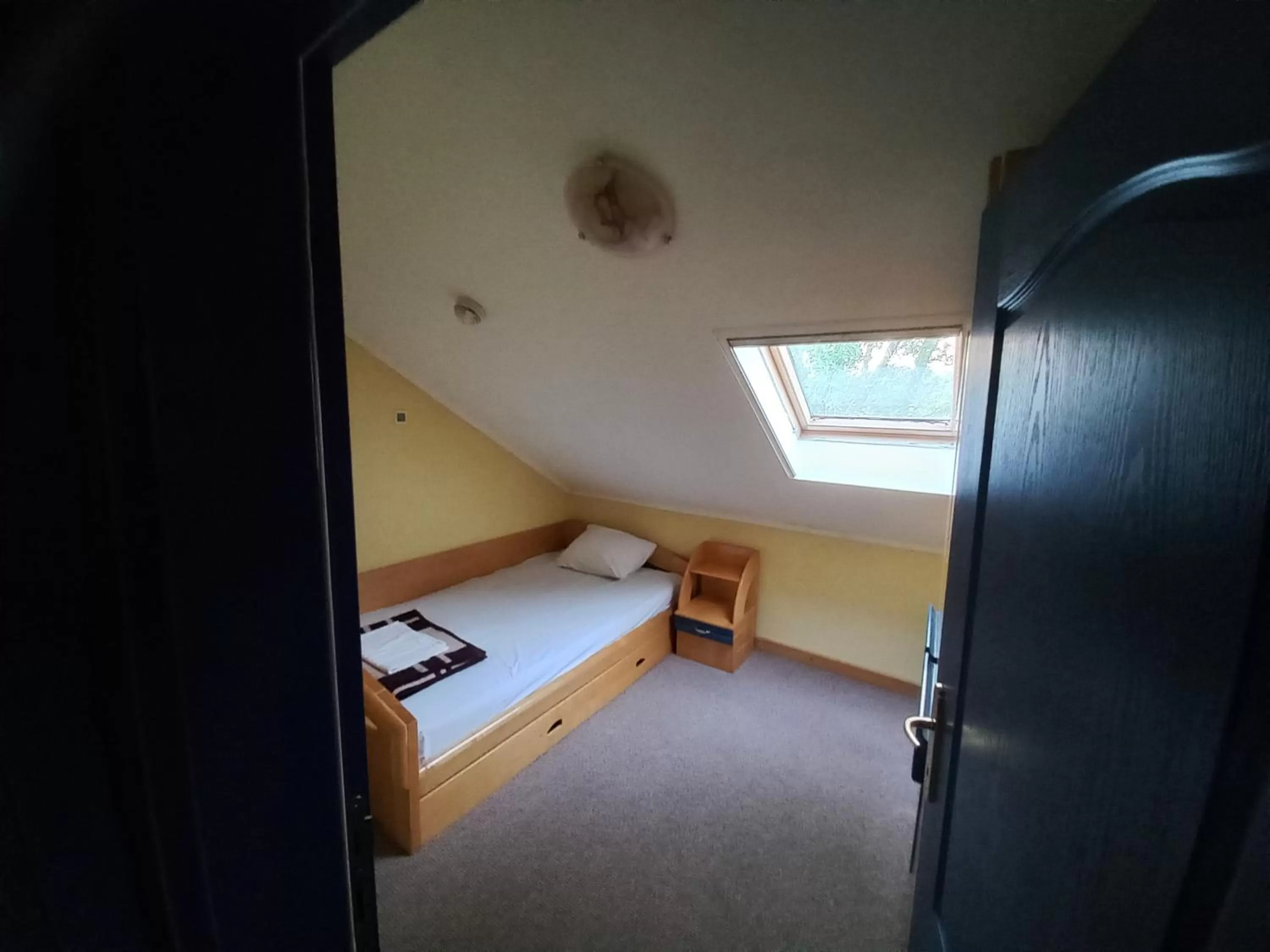 Photo of the whole room, Bed in Garni Hotel Lupus