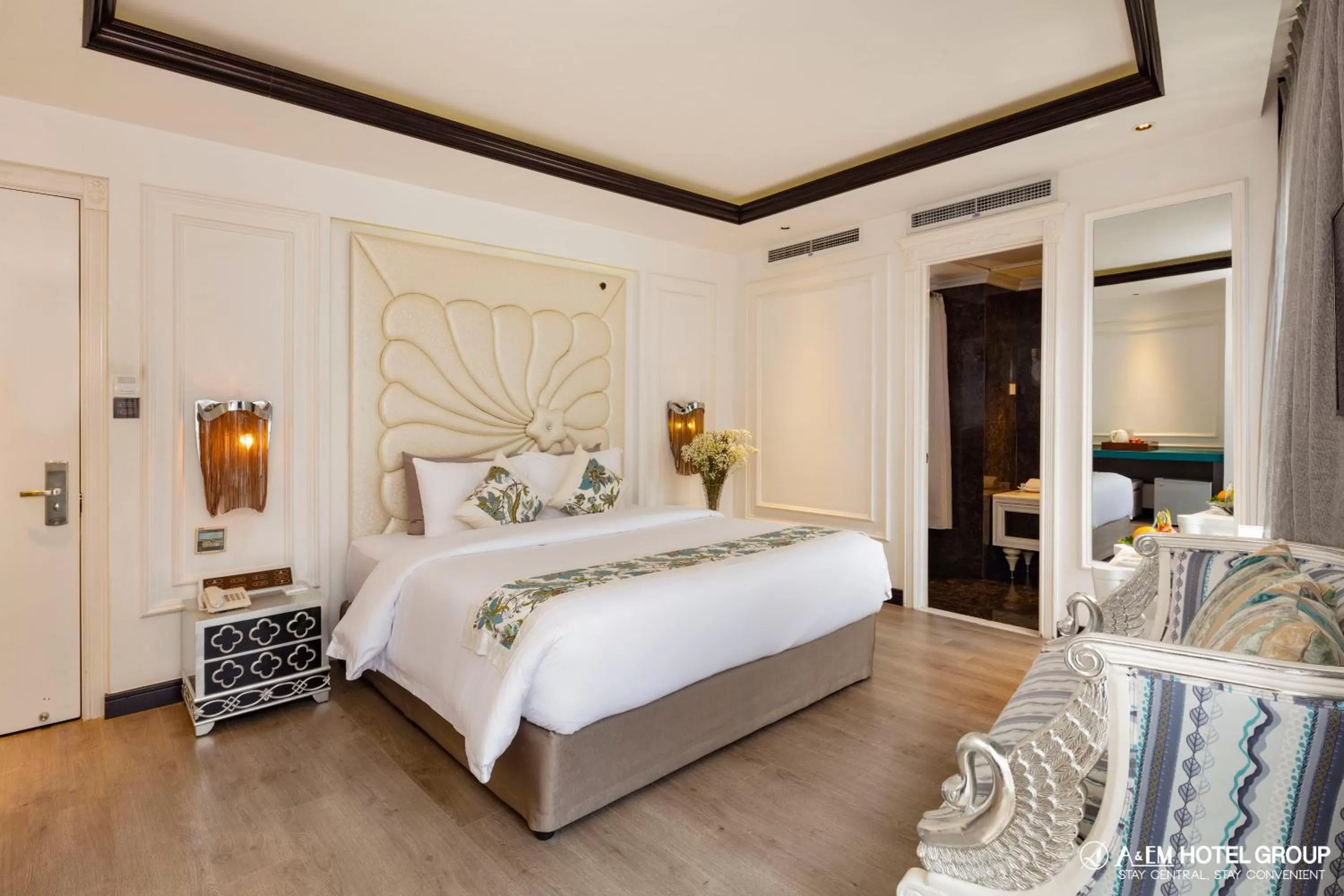 Bed in A&EM Saigon Hotel