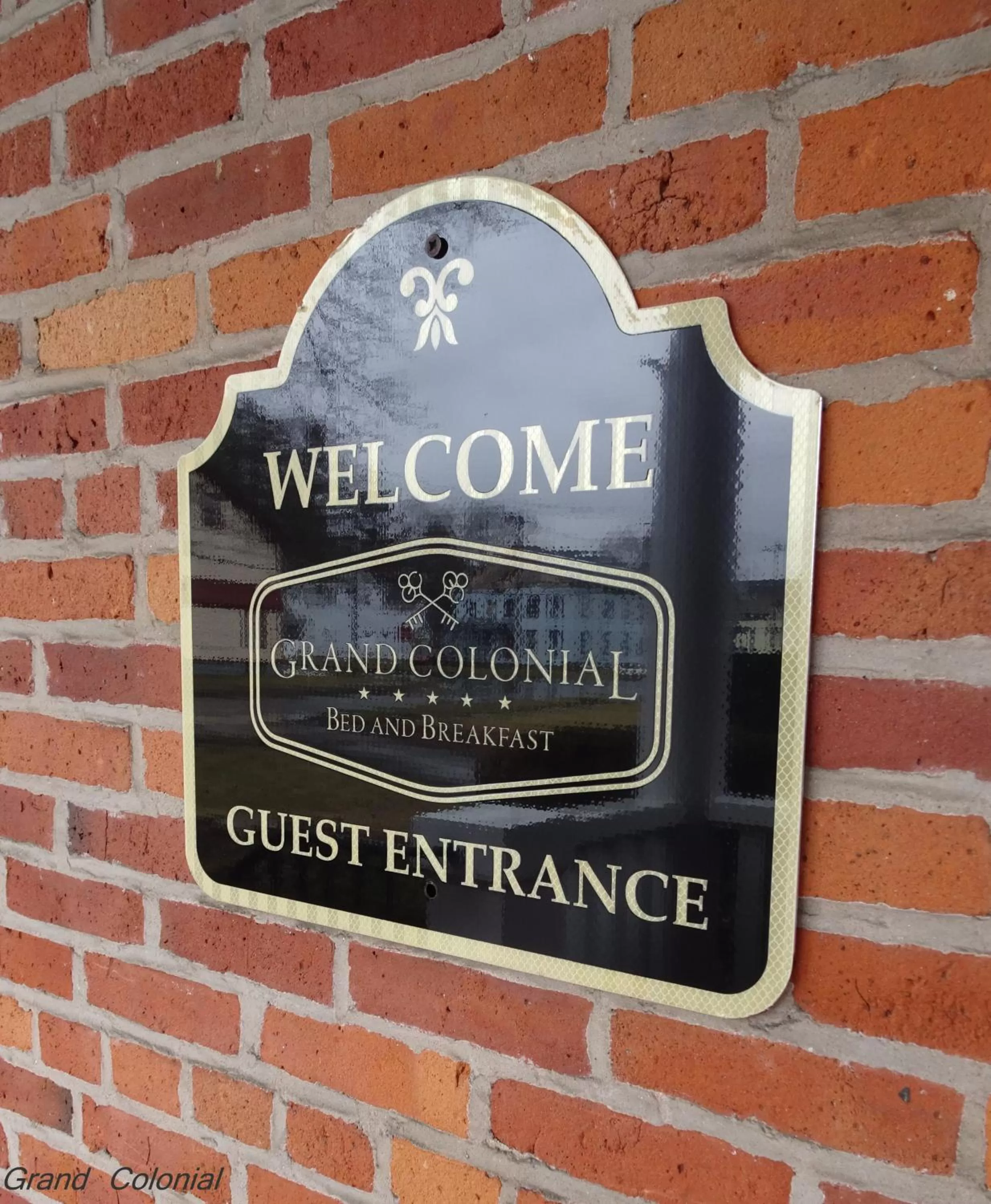 Property logo or sign in Grand Colonial Bed and Breakfast