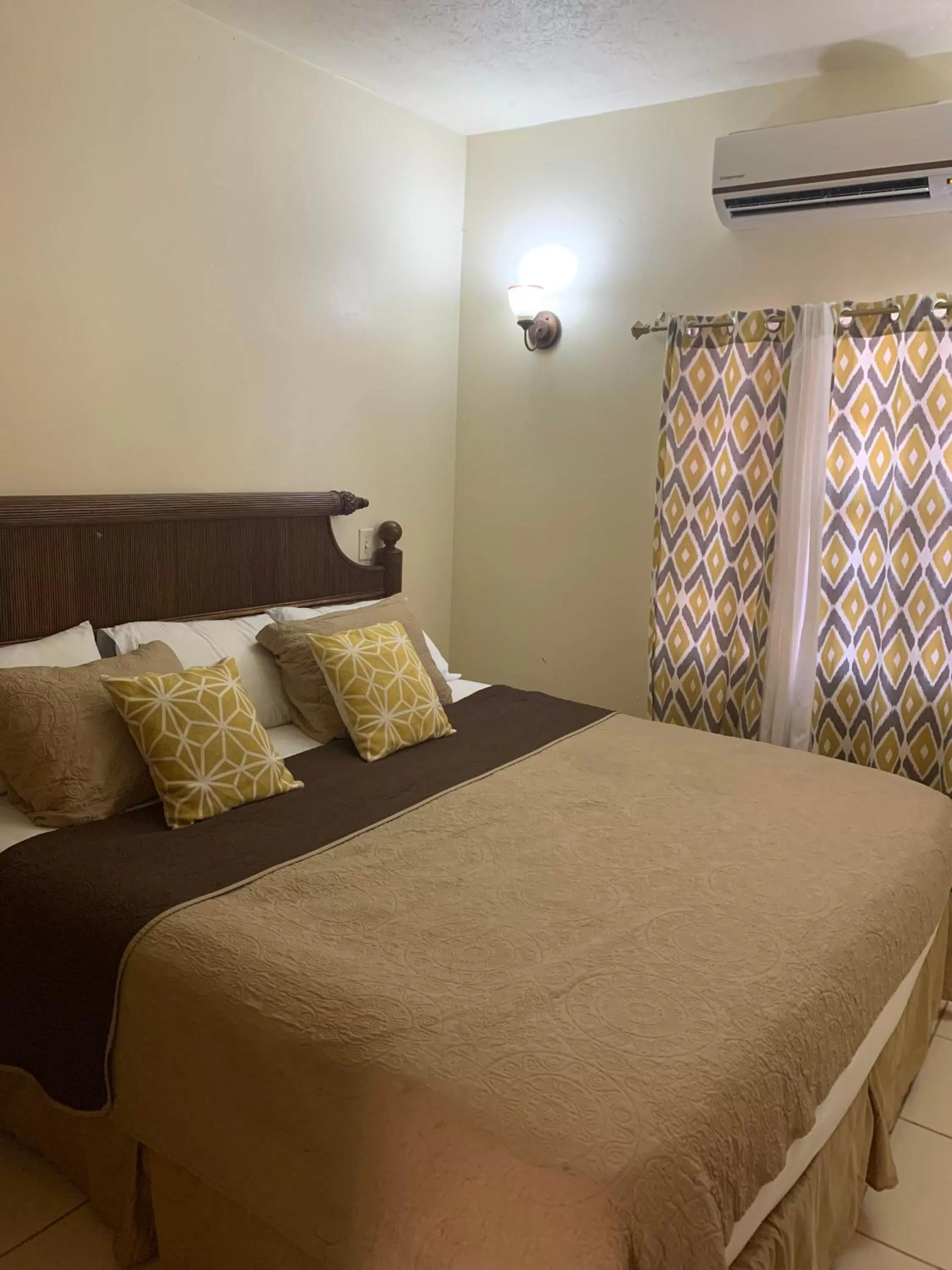 Bed in Connie's Comfort Suites