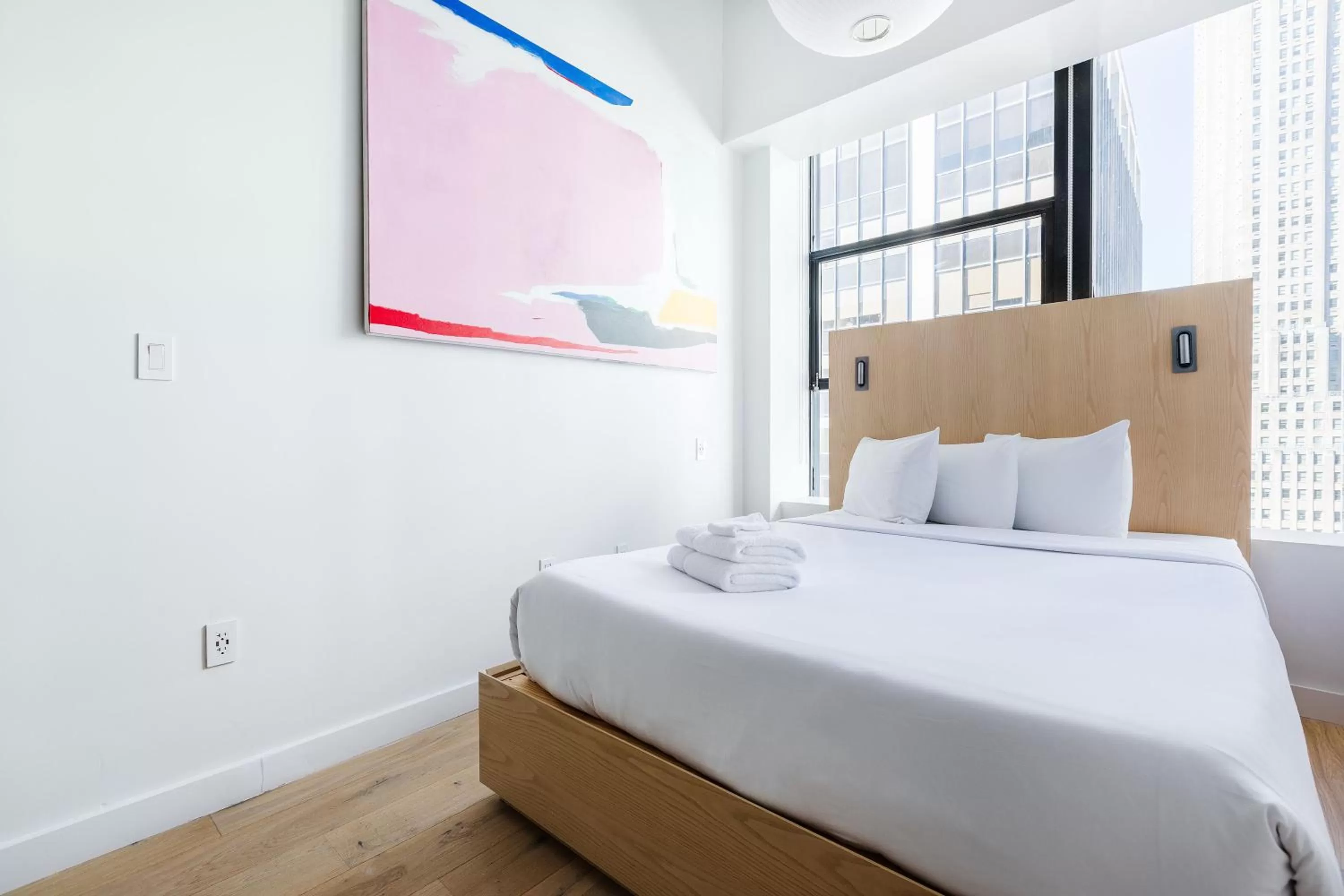 Bed in Placemakr Wall Street
