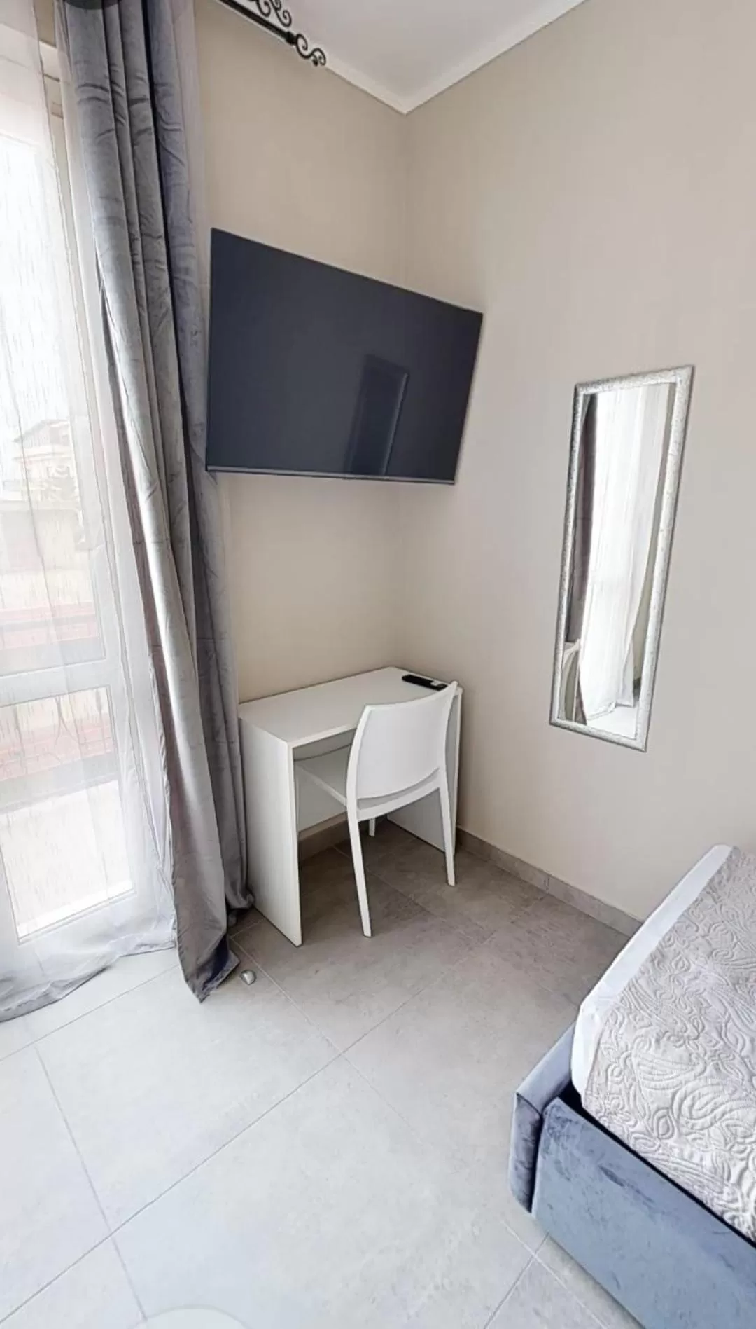 Bed, TV/Entertainment Center in B&B Al Centro