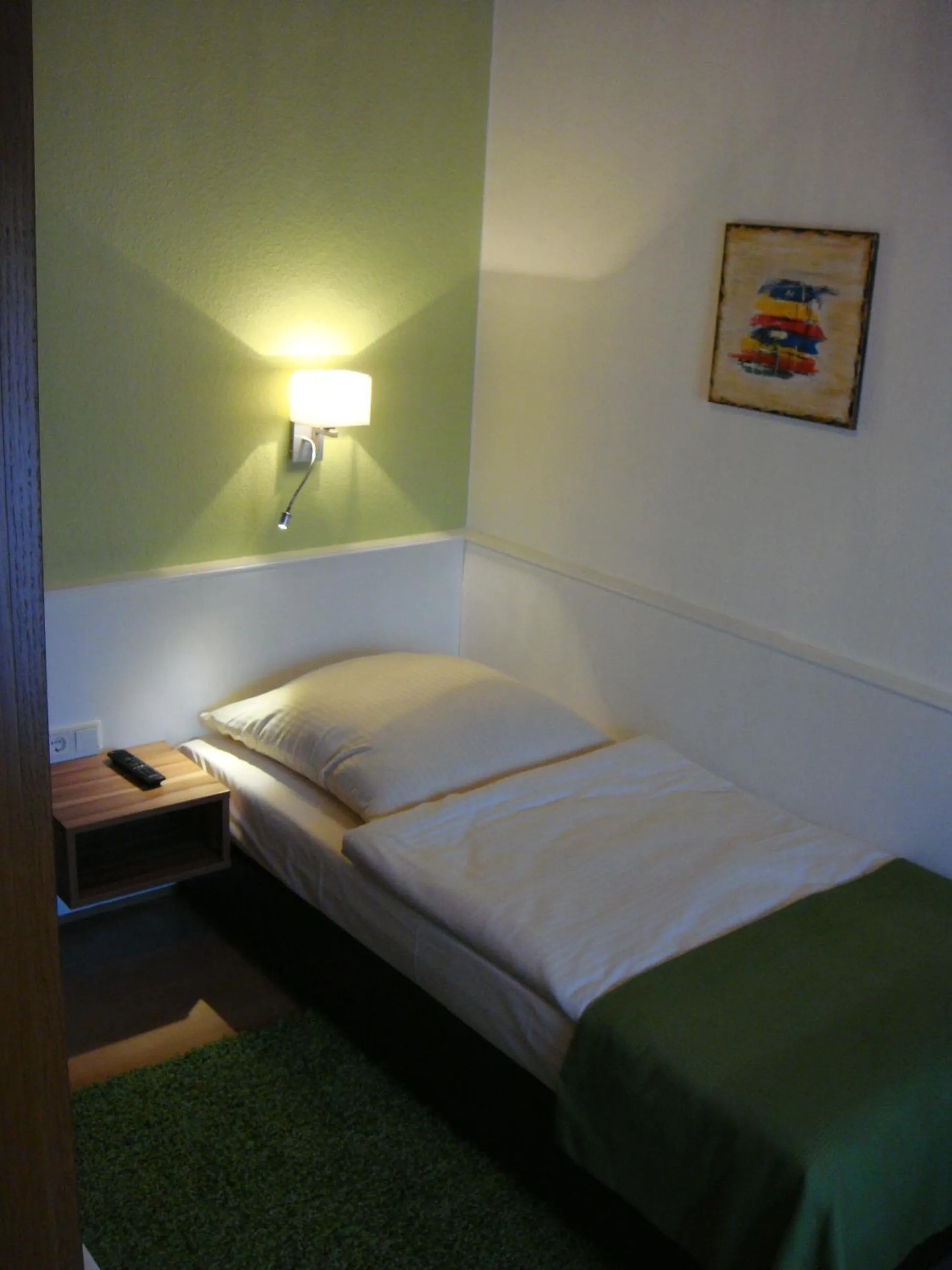 Bed in Hotel Smart-Inn