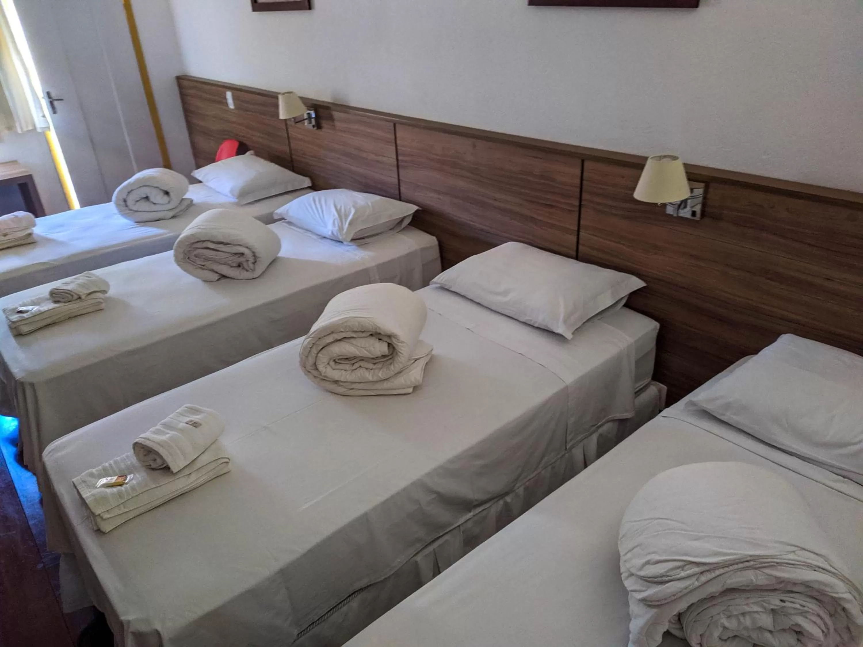 Bed in Pousada o Amanhecer