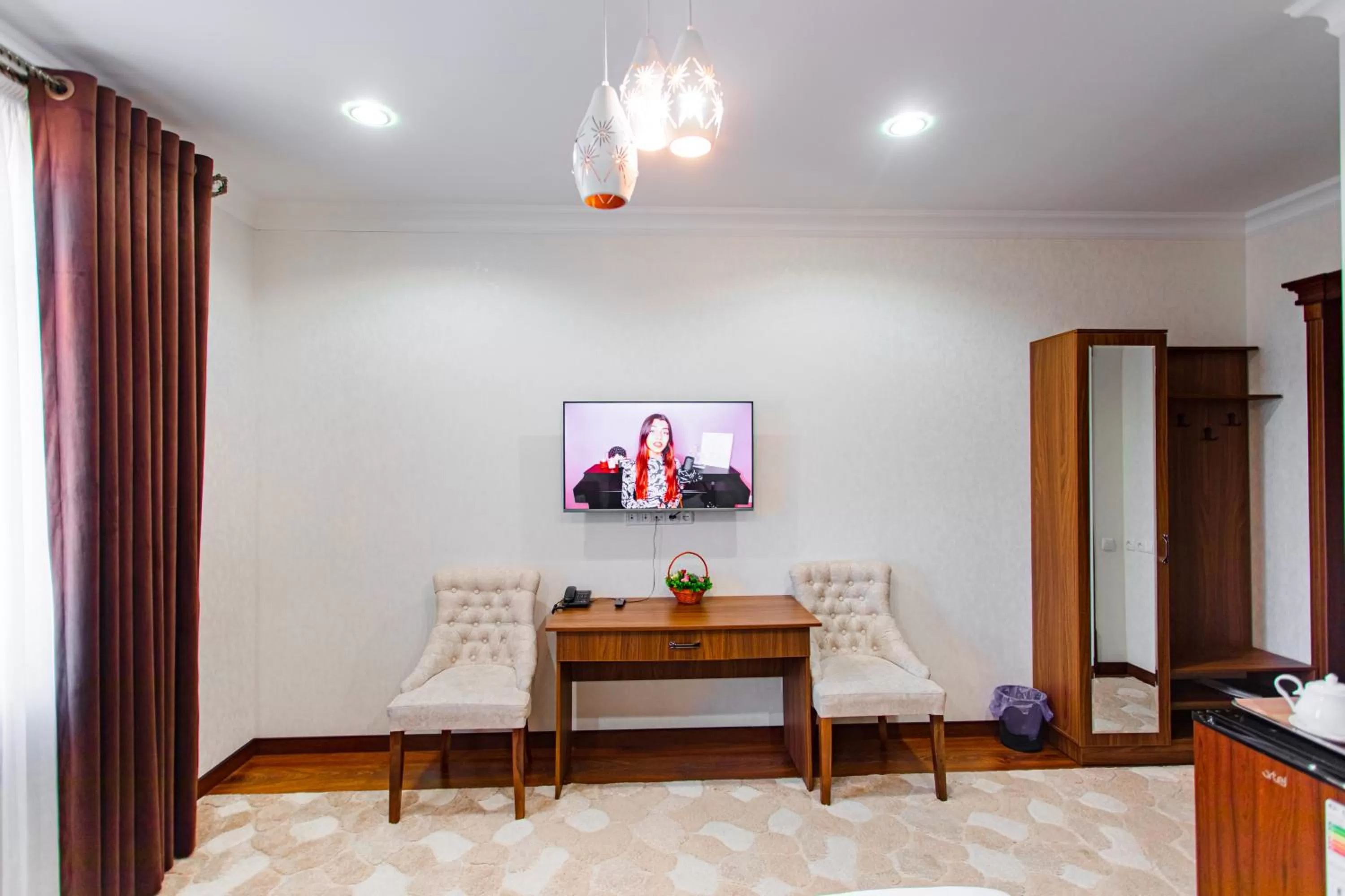 Photo of the whole room, TV/Entertainment Center in Diyor Gold Hotel