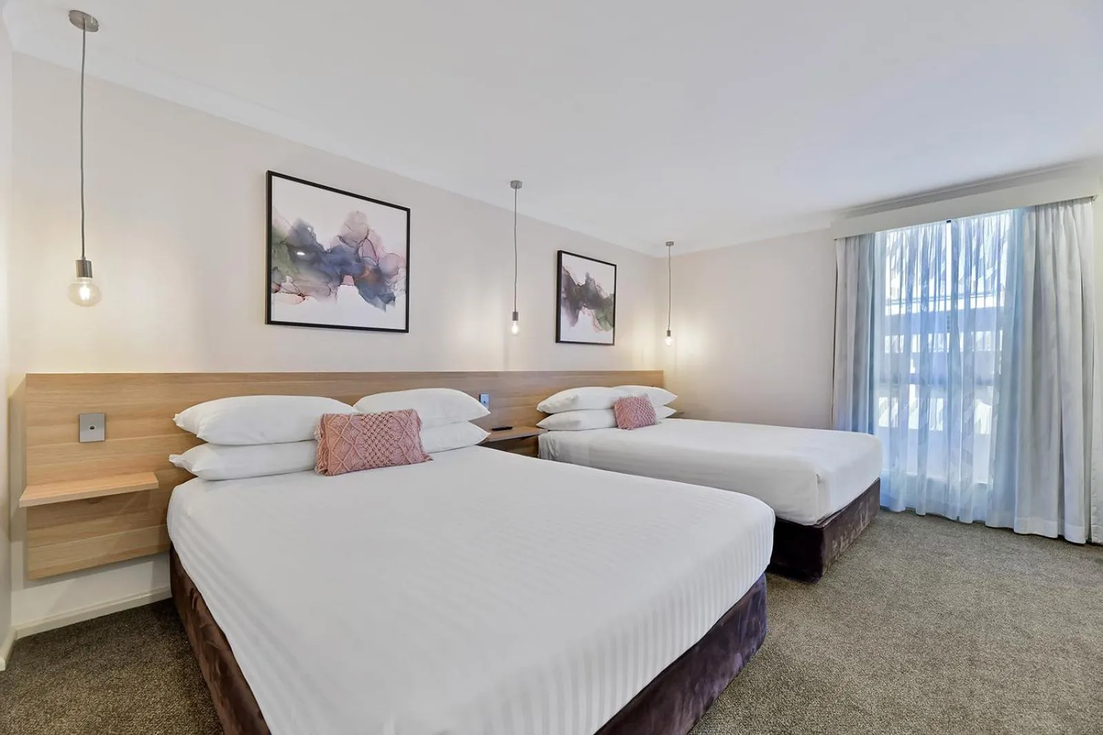 Bed in Central Caleula Motor Lodge