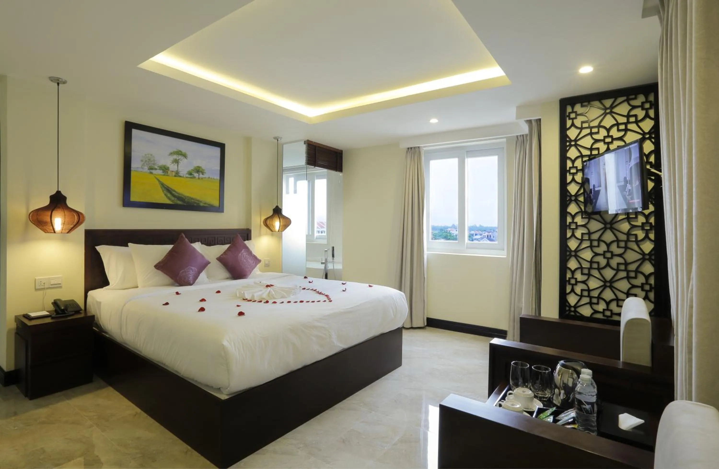 TV and multimedia, Bed in River Suites Hoi An