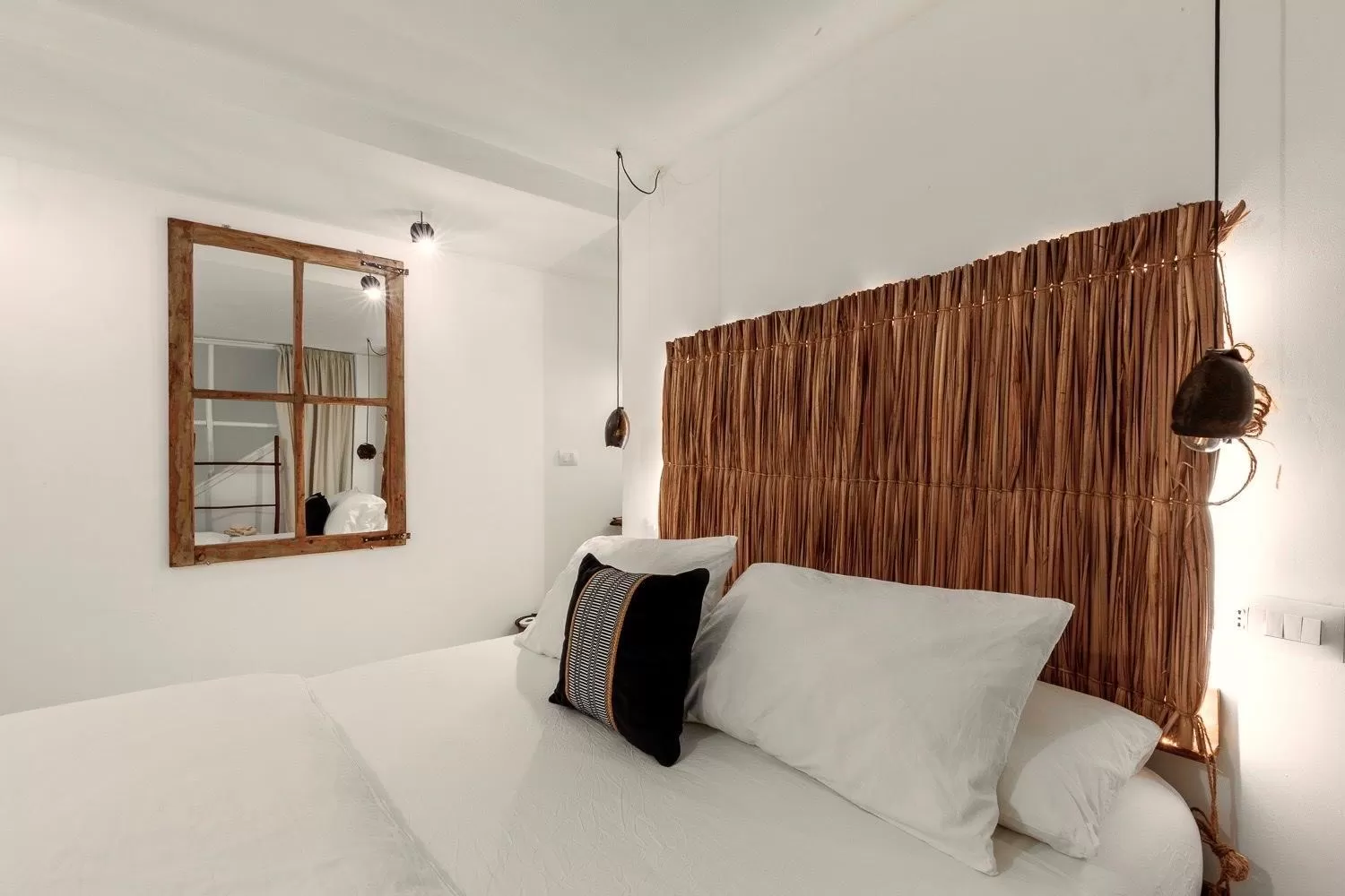 Bed in Crobi Museum and Suites