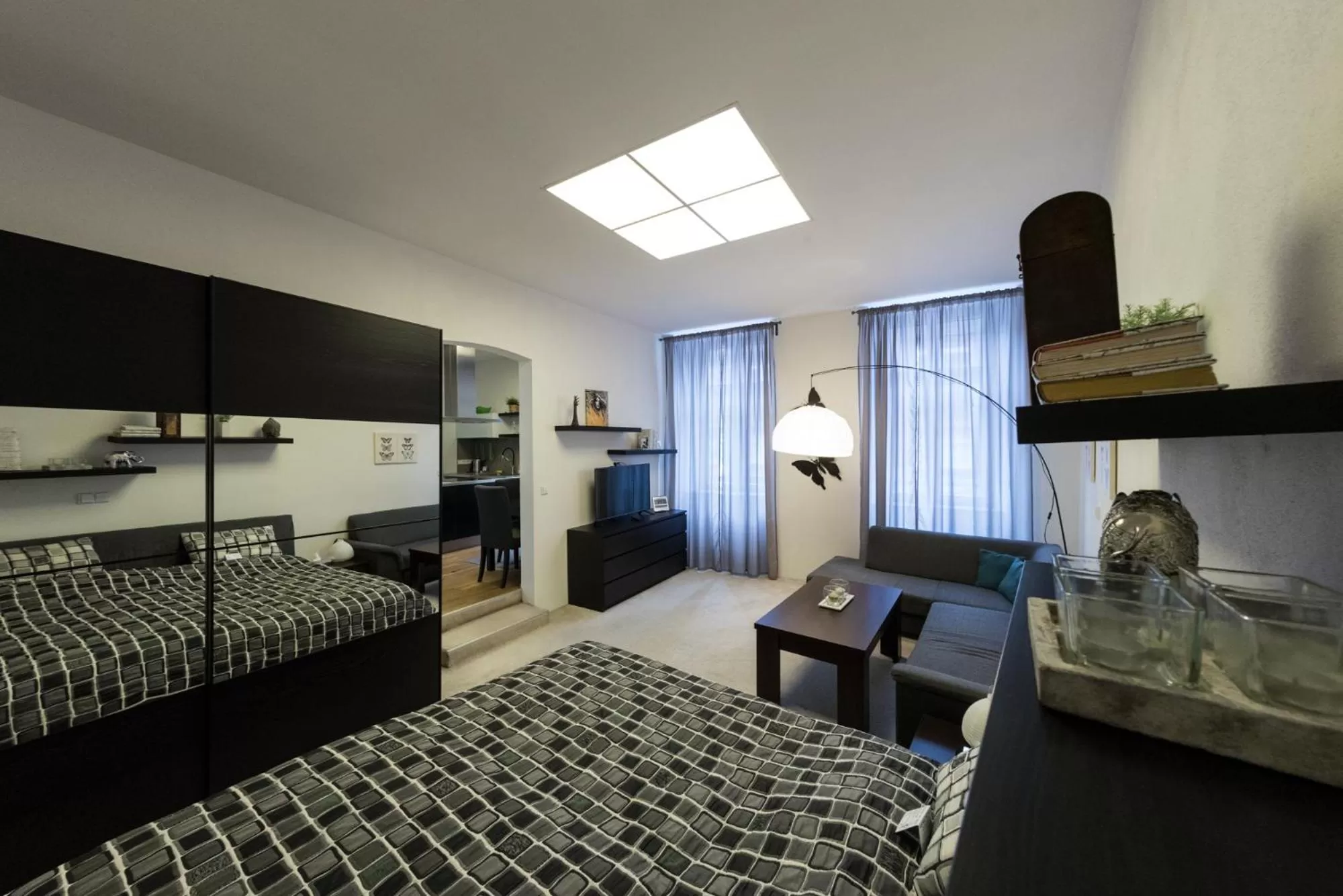 Living room, Bed in Hotel Plzeň