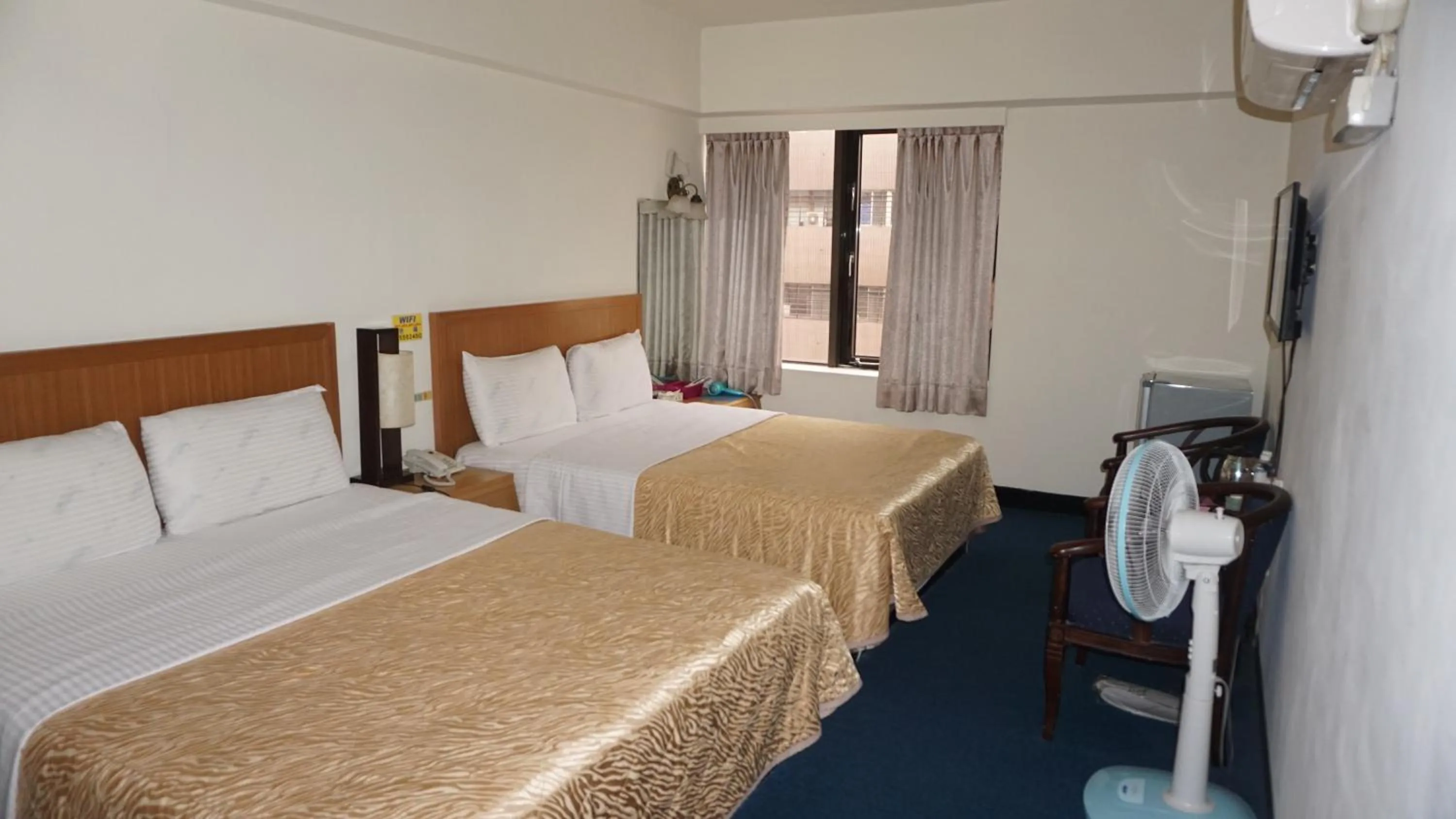 Bed in Chian Huei Business Hotel