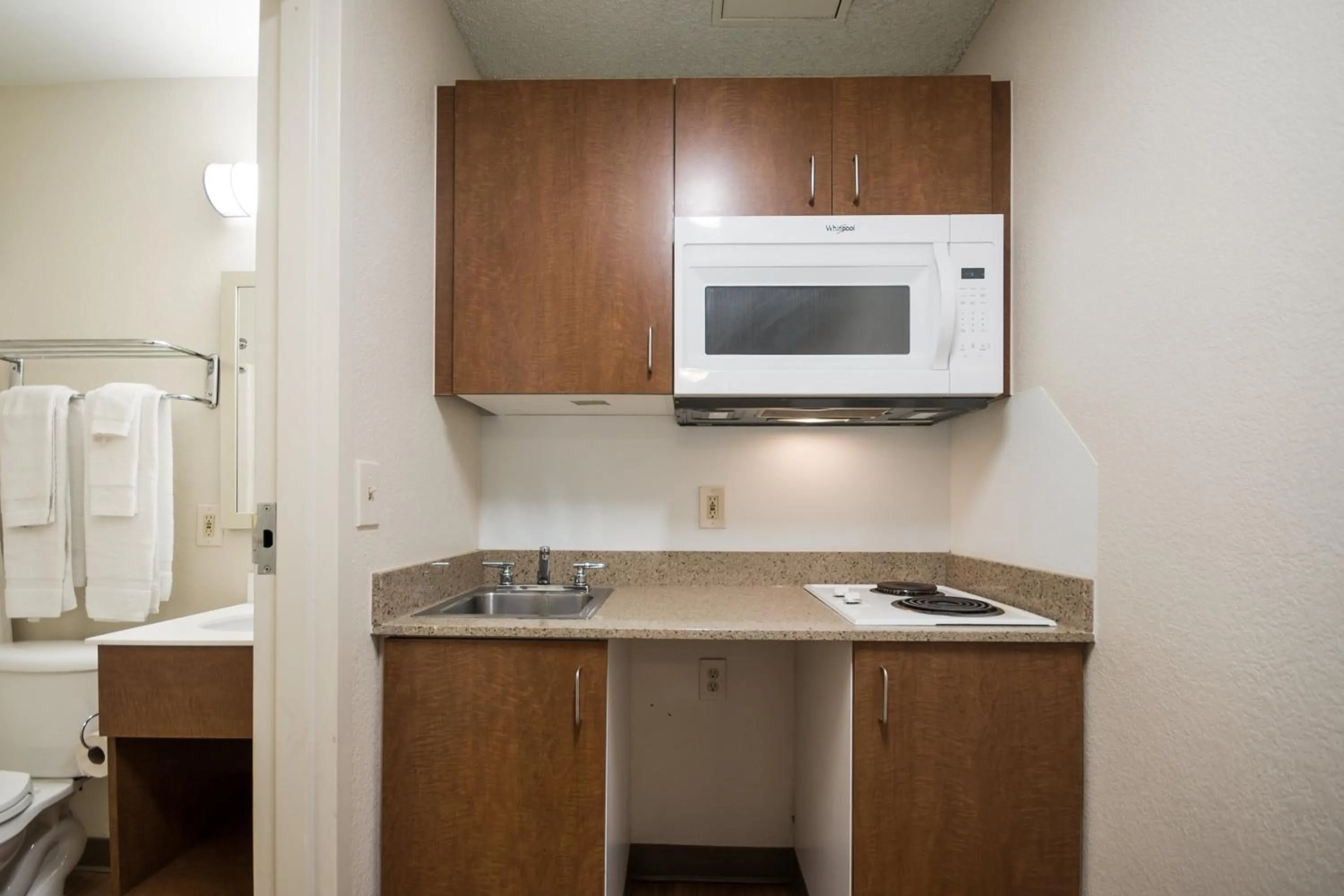 Photo of the whole room in HomeTowne Studios by Red Roof Seattle - Kent/Des Moines