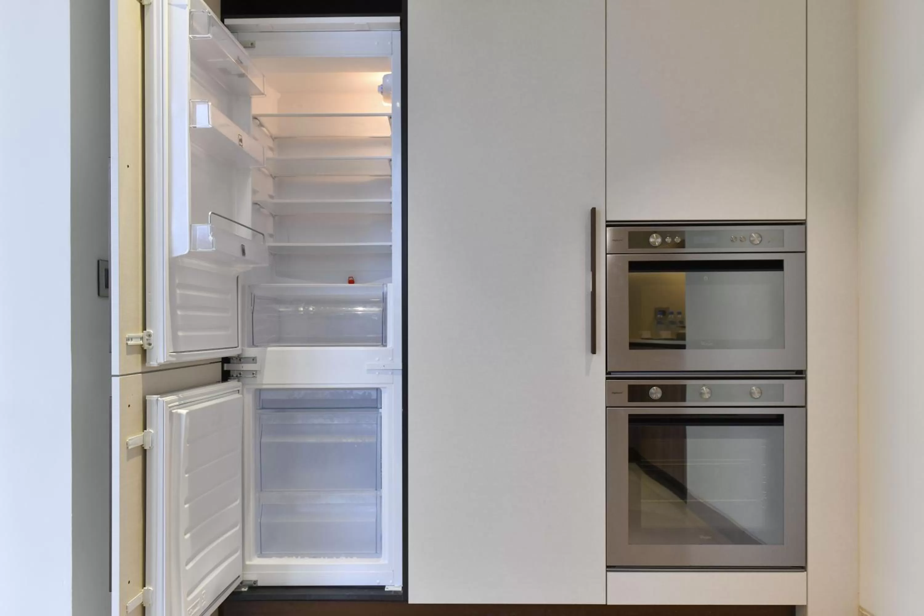 Kitchen or kitchenette in voco Doha West Bay Suites by IHG