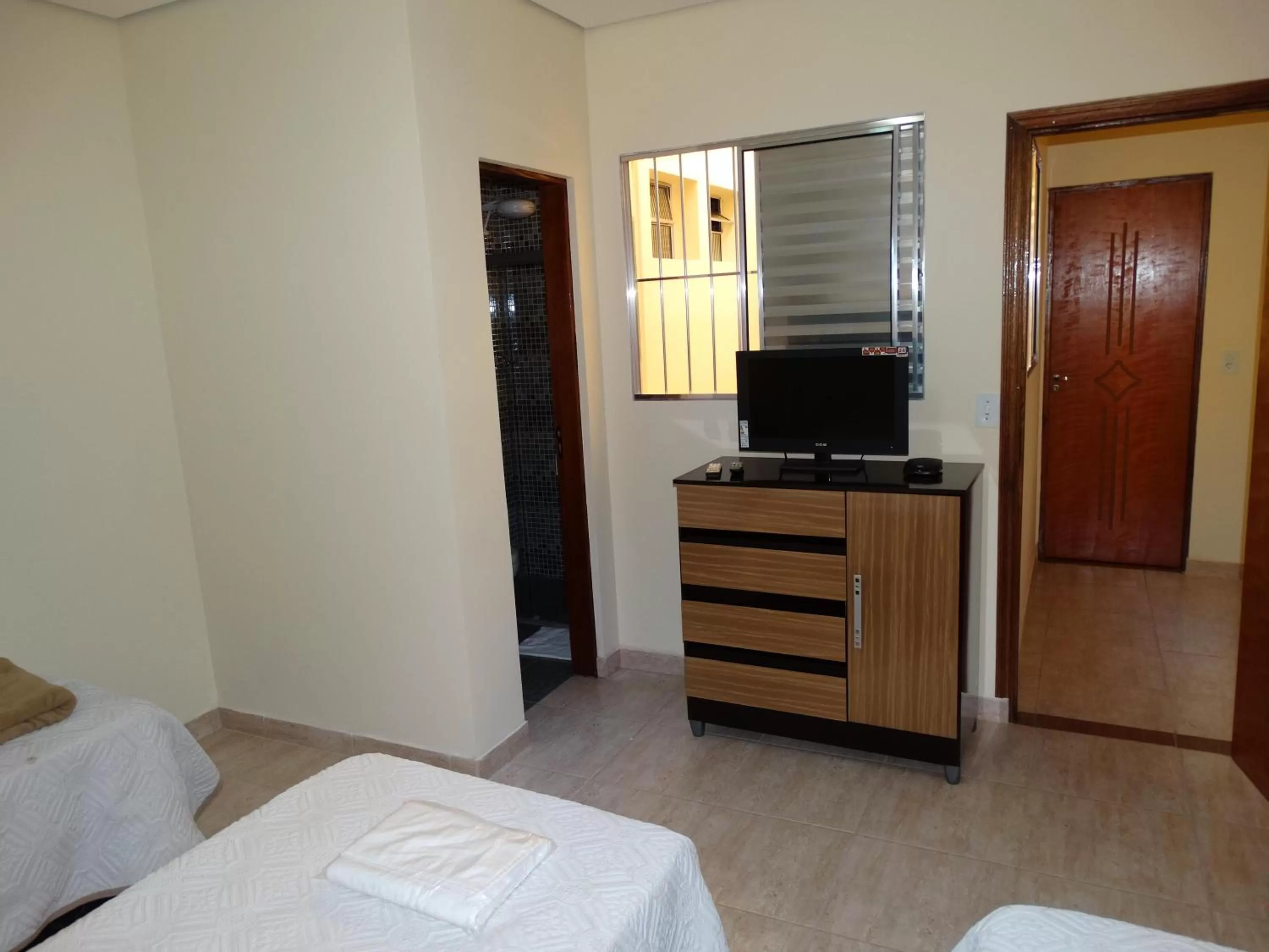 Photo of the whole room, Bed in Pousada F7