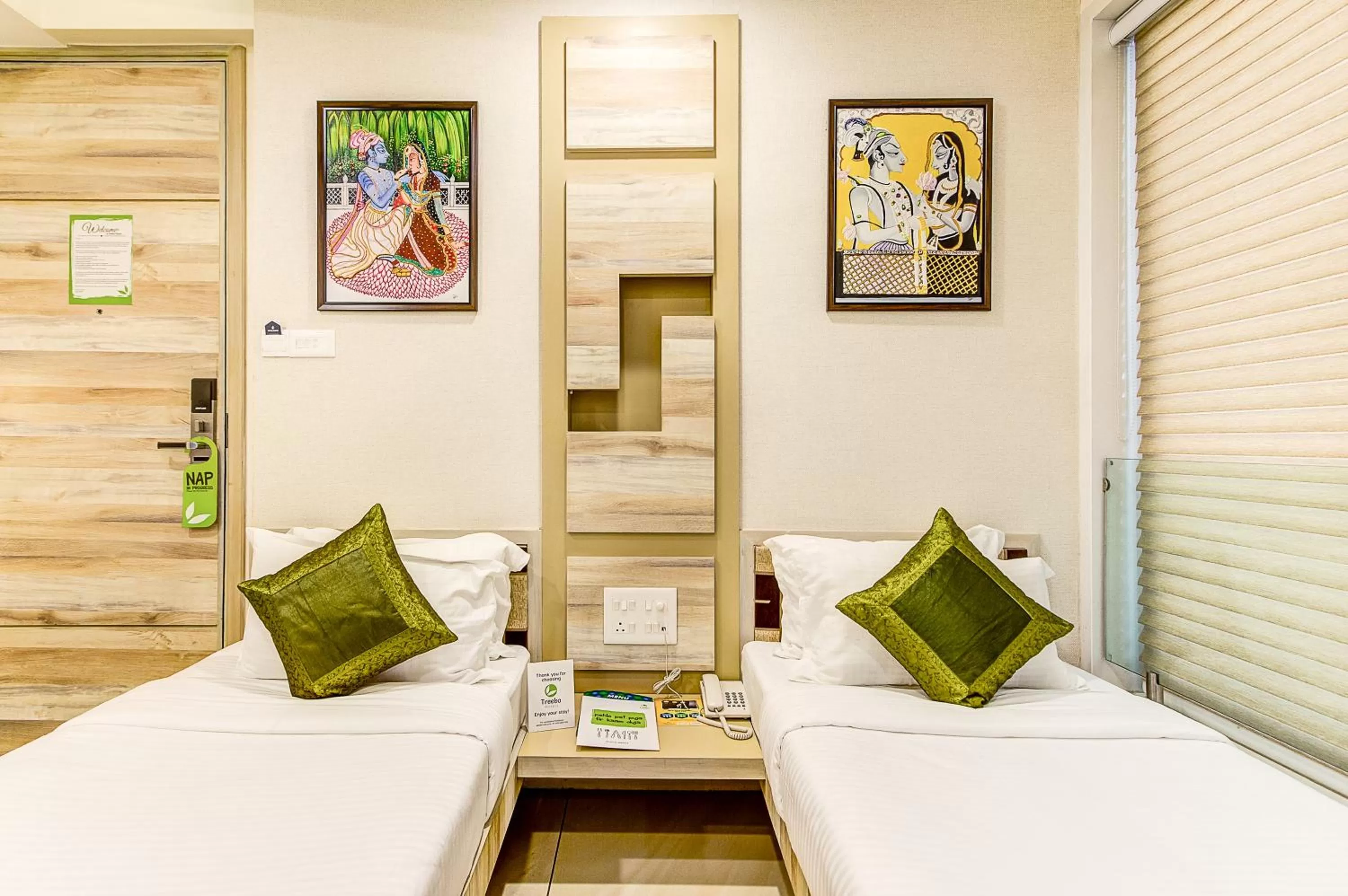 Bed in Treebo Daksh Residency