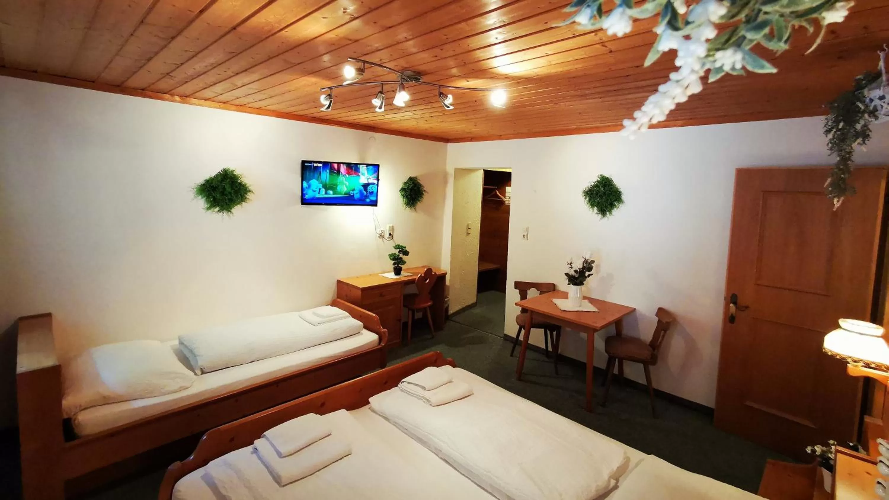 Photo of the whole room, Bed in Gasthof Geronimo