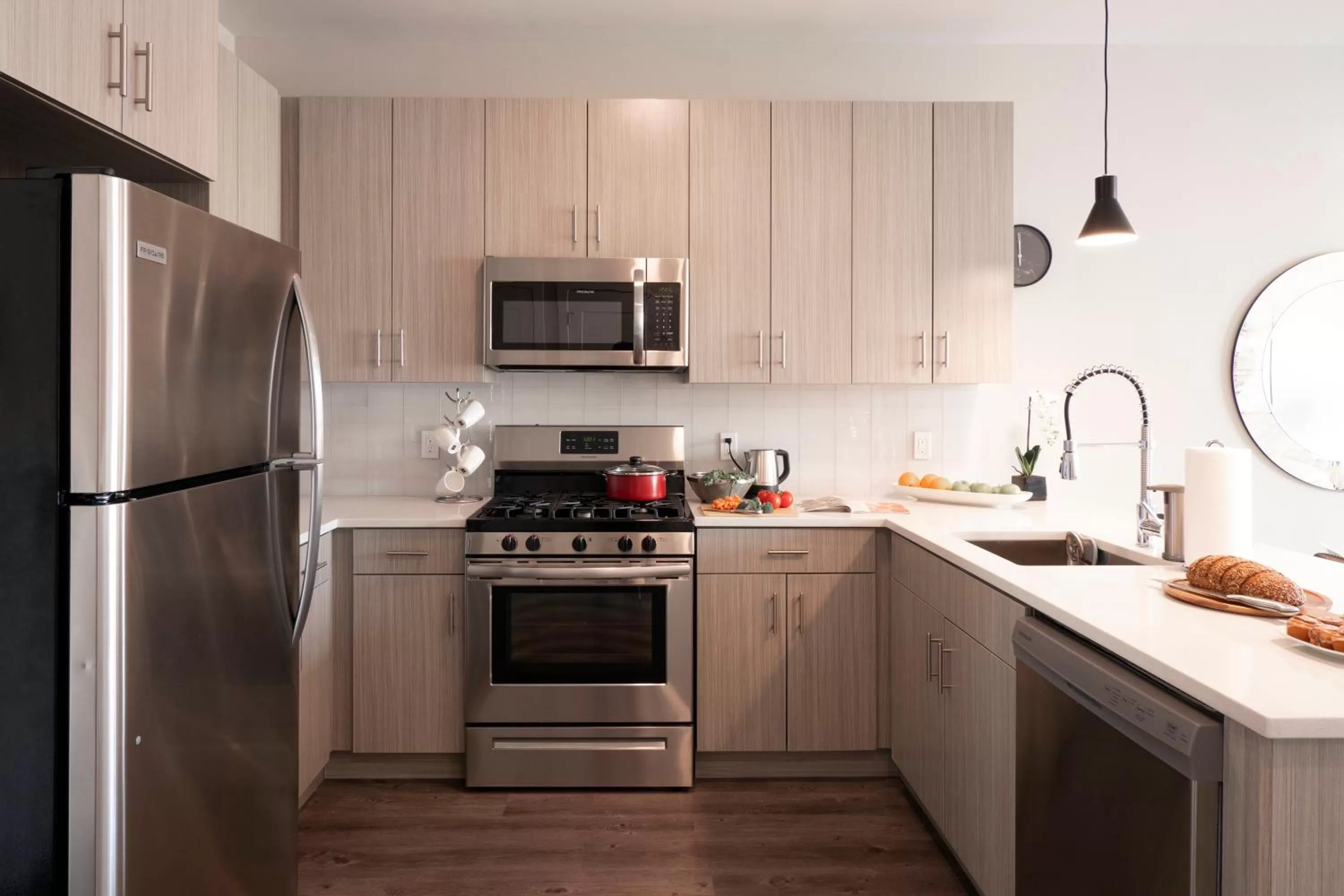 Kitchen or kitchenette in Luxury Furnished Apartments by Hyatus Downtown at Yale