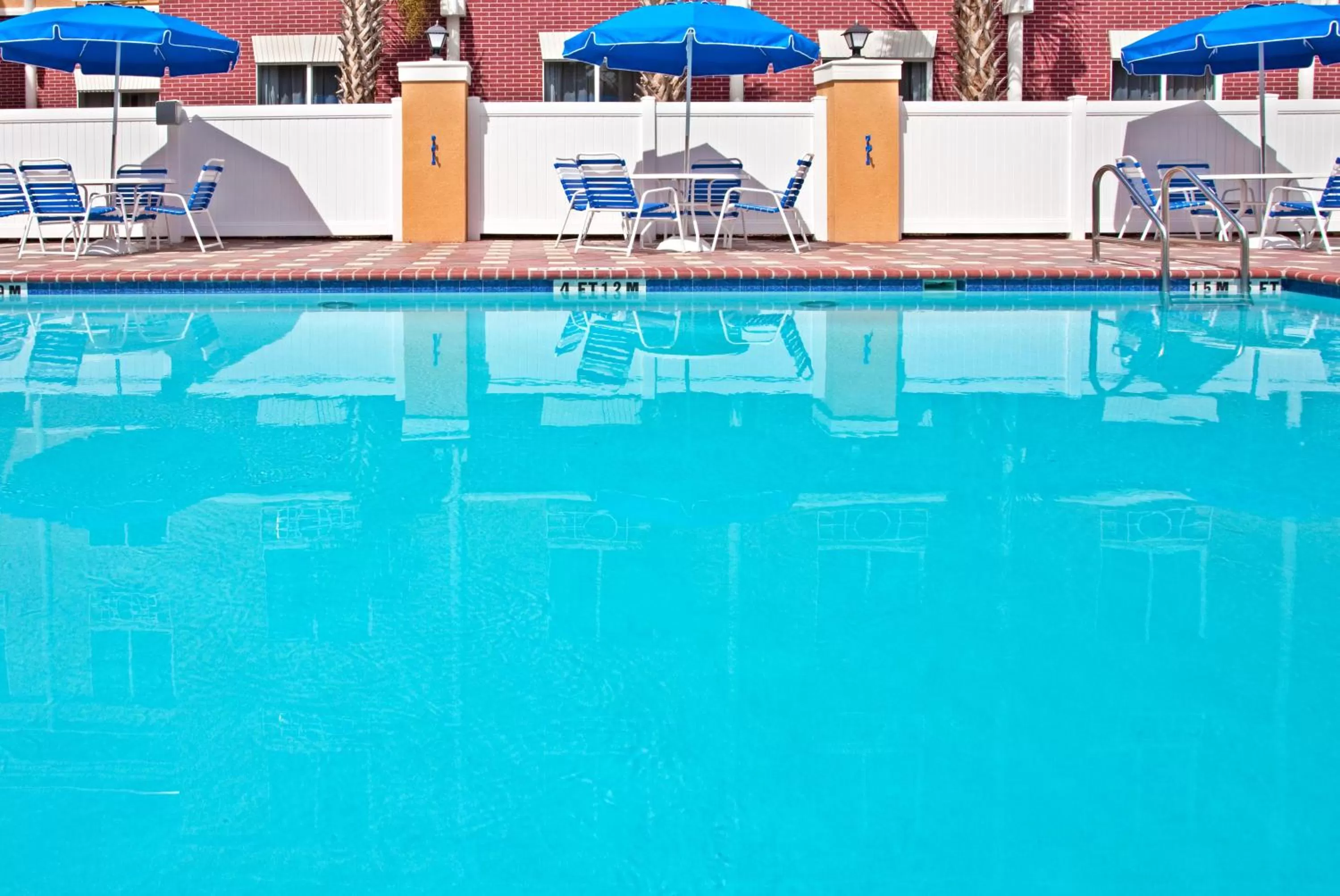 Swimming pool in Holiday Inn Express Hotel & Suites Brooksville-I-75 by IHG