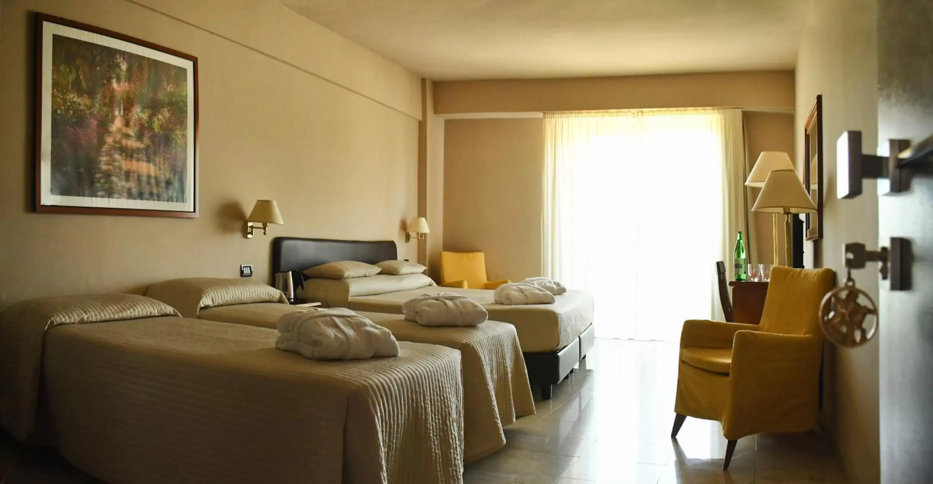 Comfort Quadruple Room with Spa Access in Hotel San Giorgio Comfort Quadruple Room with Spa Access in Hotel San Giorgio