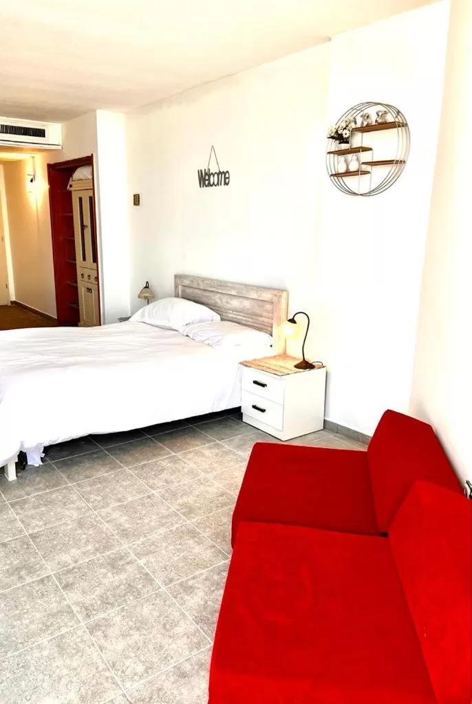 Bed in Raphael Apartments