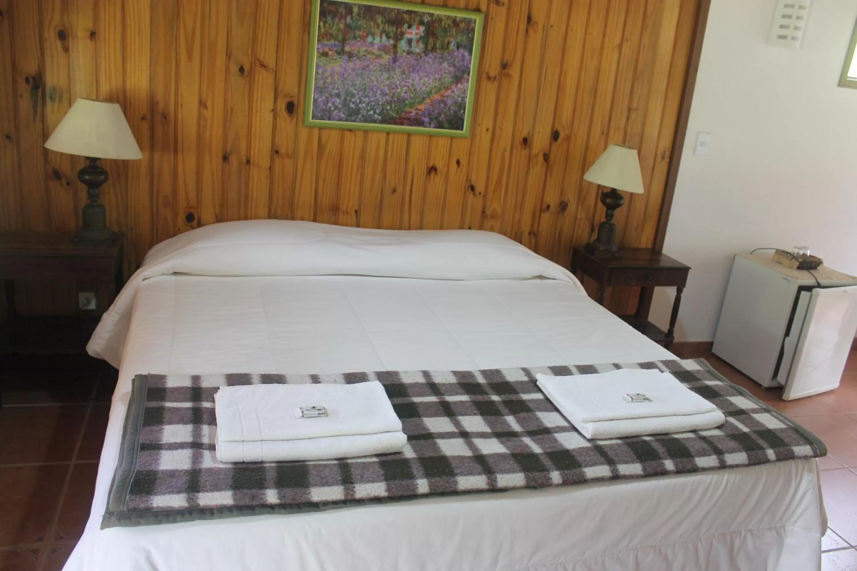 Bed in Pousada Mariza