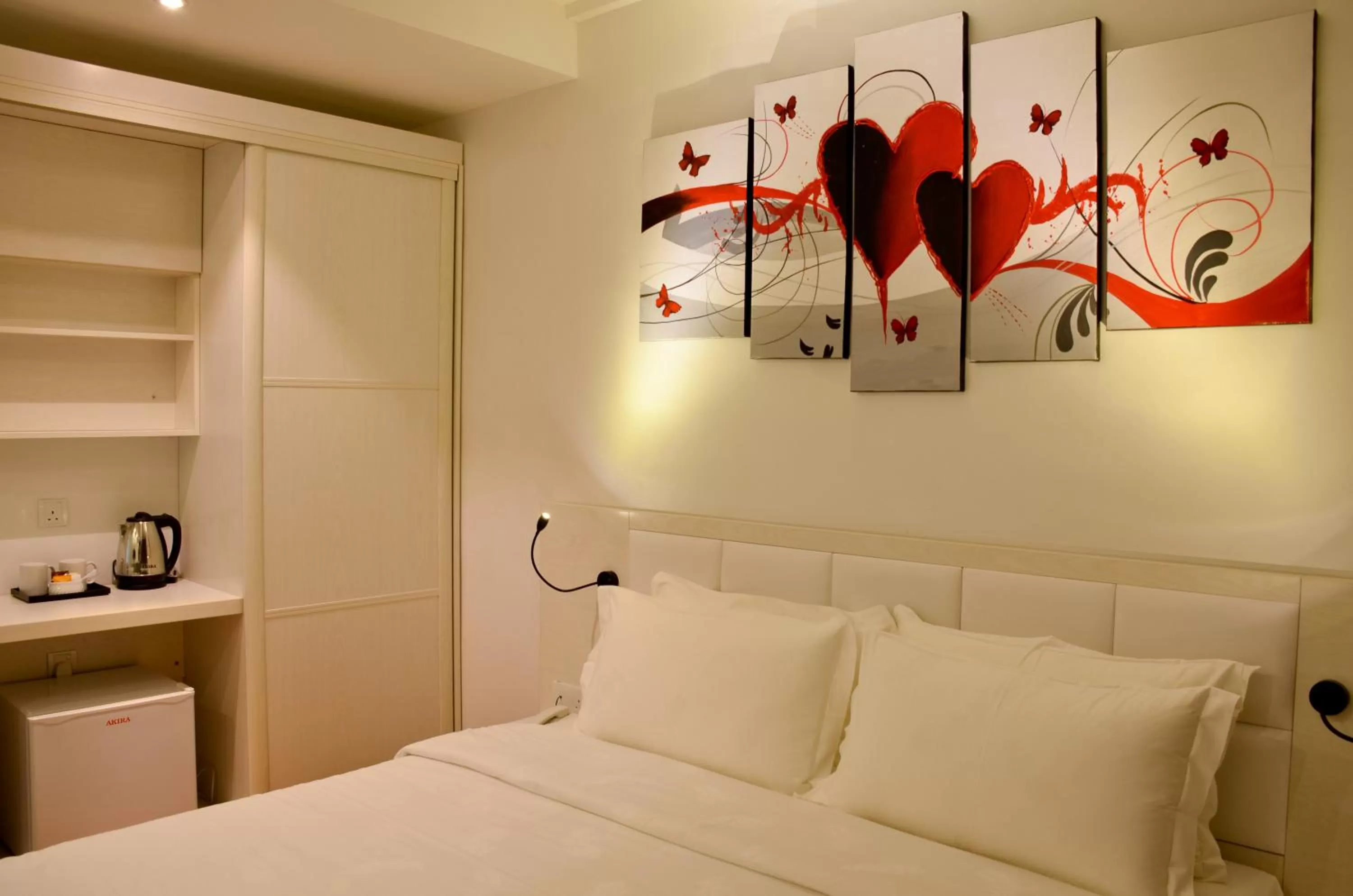 Bed in Pine Garden Hotel