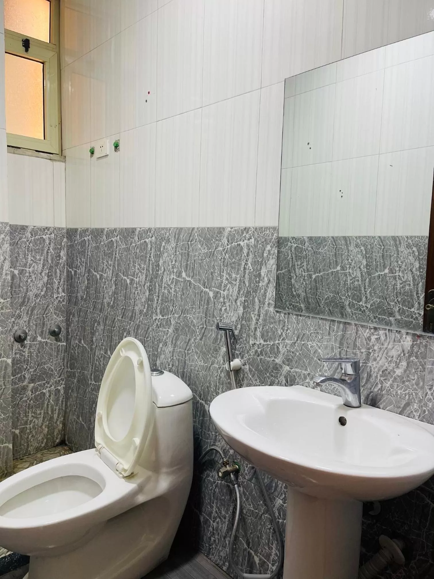 Toilet, Bathroom in Goza Guest House