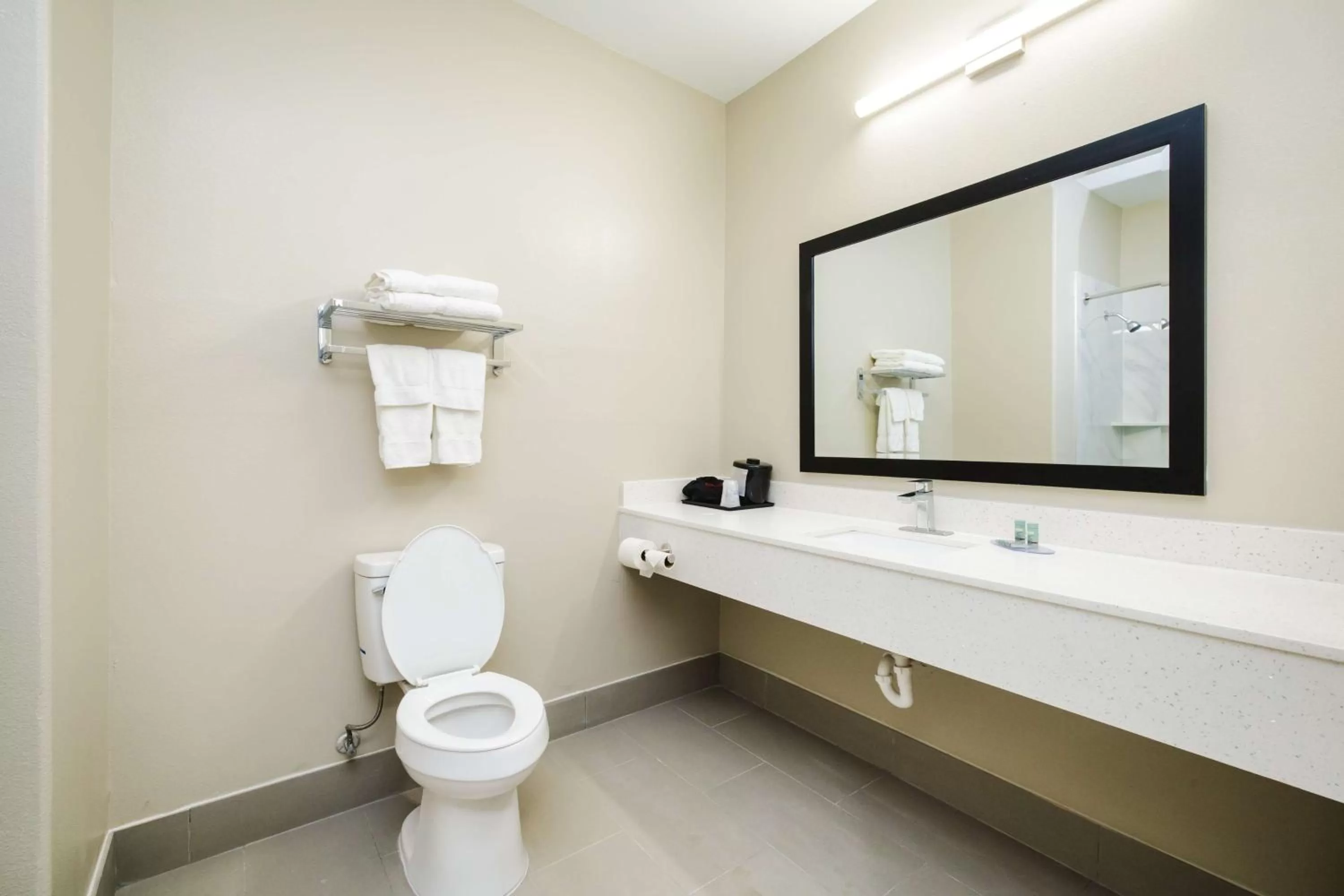 Bathroom in SureStay Studio by Best Western Conroe Downtown