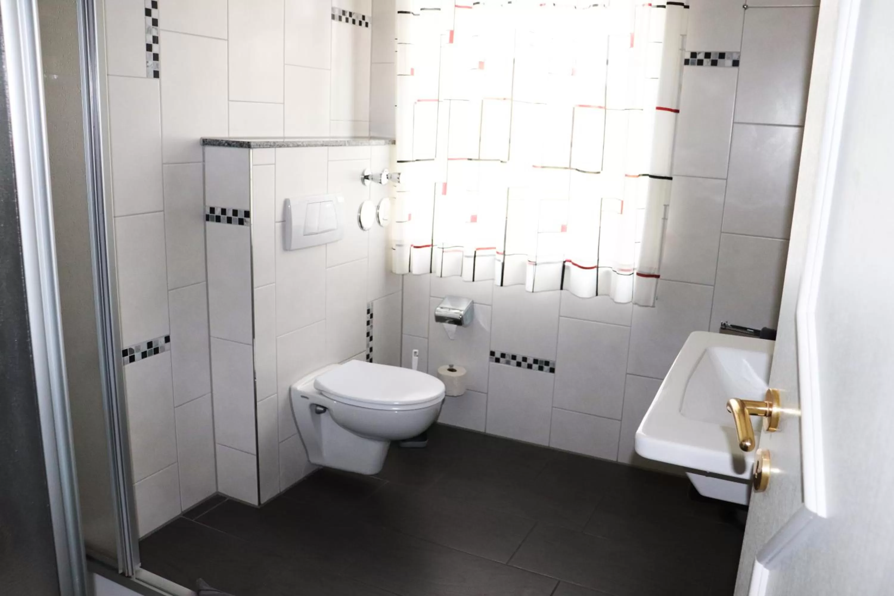 Bathroom in Hotel Rehkitz