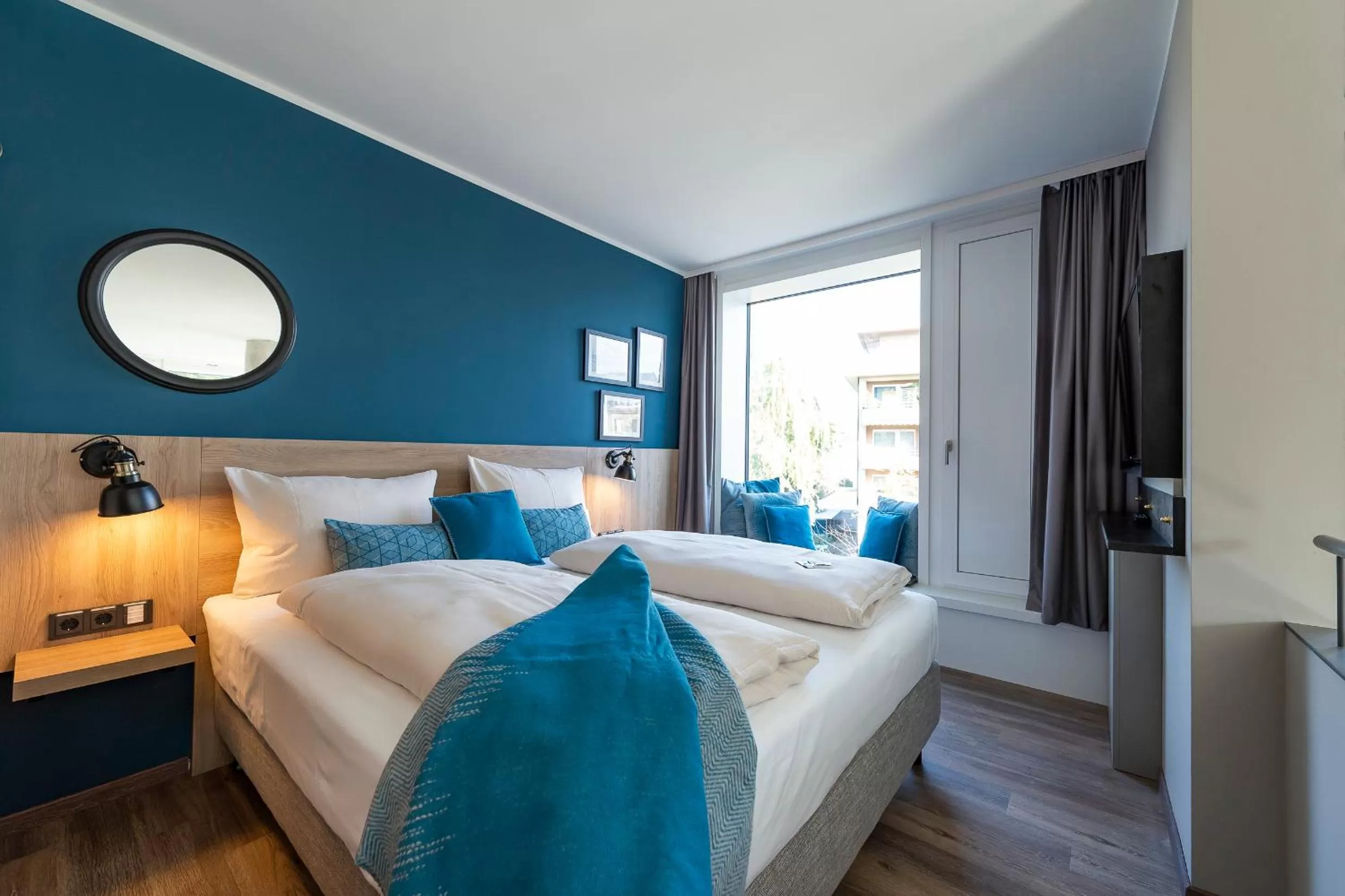 Bed in HARBR Hotel Konstanz, a member of Radisson Individuals