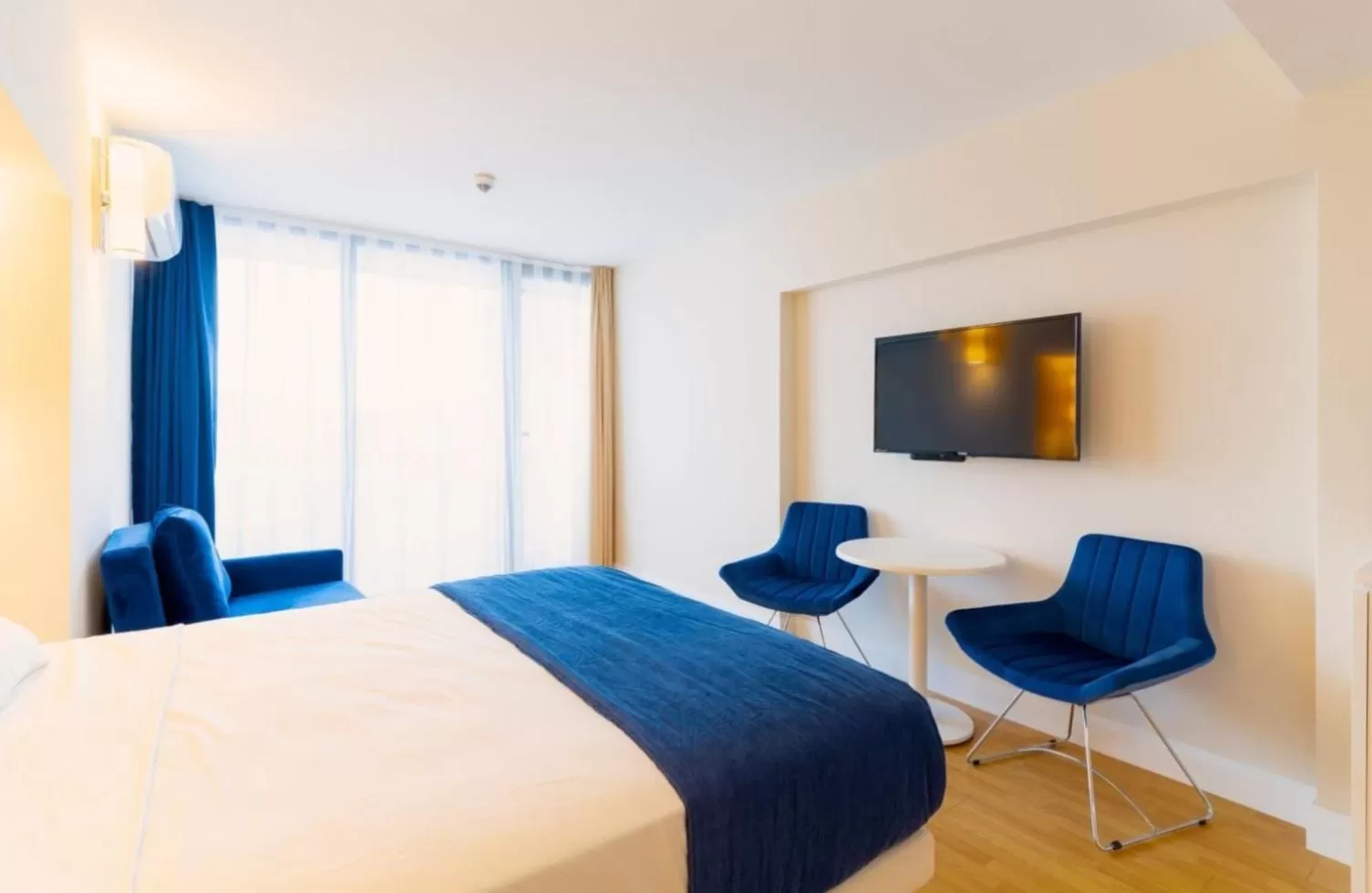 Communal lounge/ TV room, Bed in Batumi Orbi City Wonderful Sea View