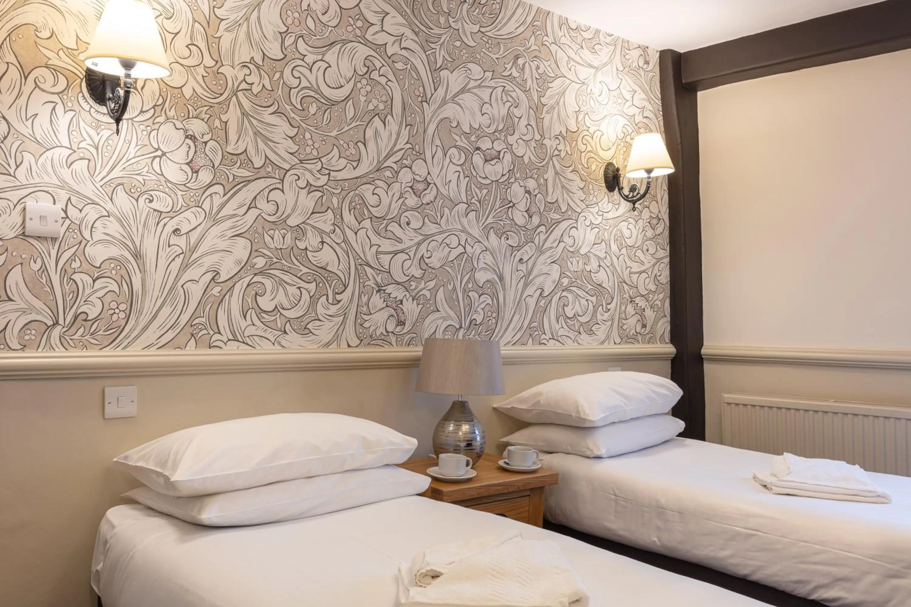 Bedroom, Bed in The New Inn by Roomsbooked