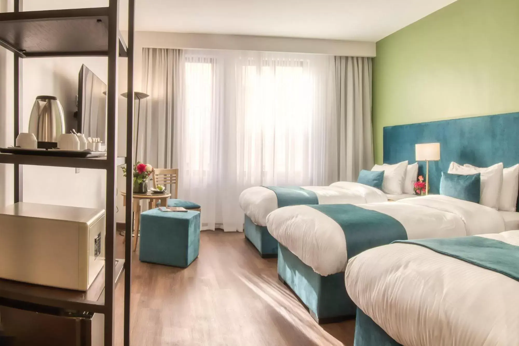 Standard Triple Room in The Liwan Hotel Standard Triple Room in The Liwan Hotel