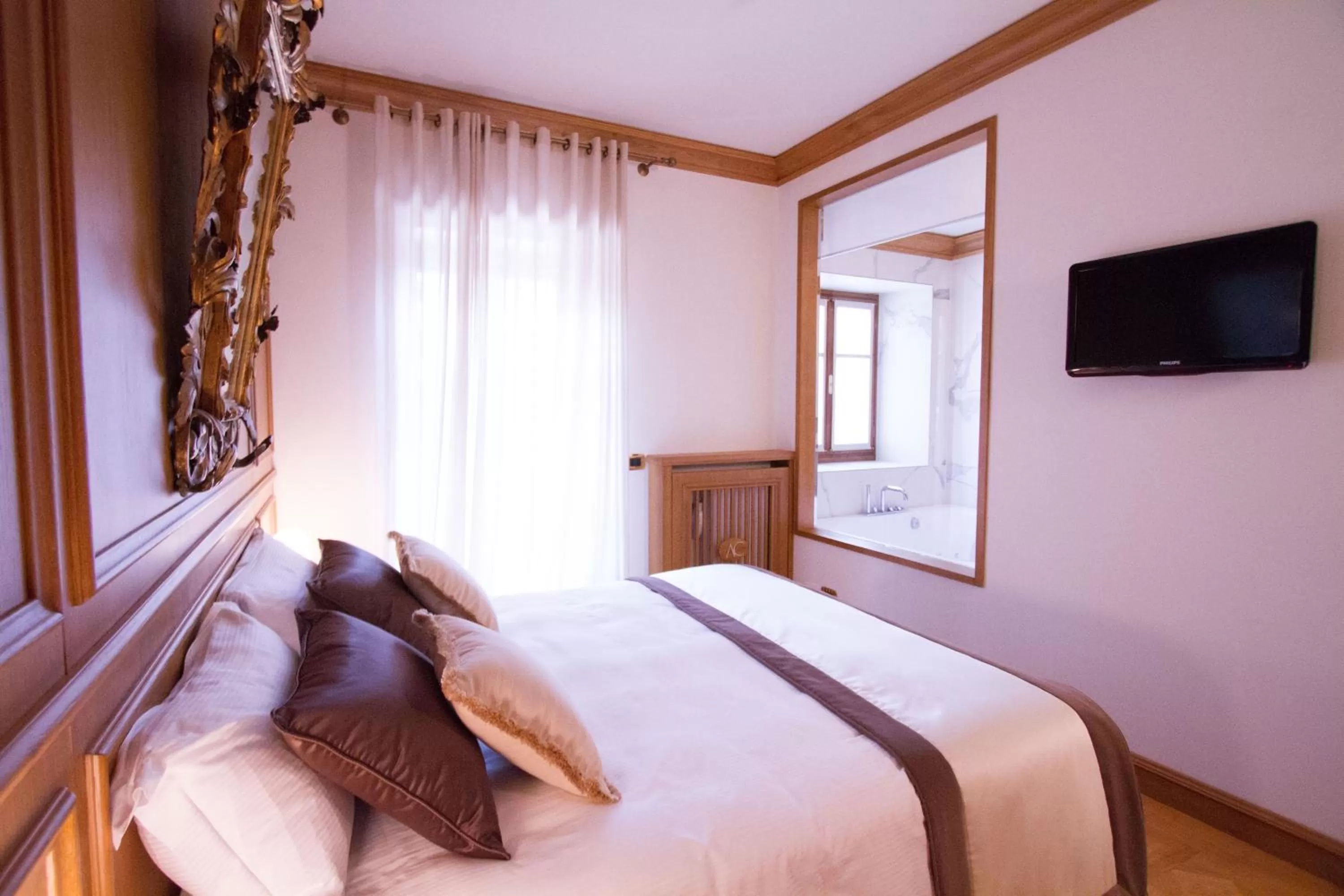 Bed in Ambra Cortina Luxury&Fashion Hotel