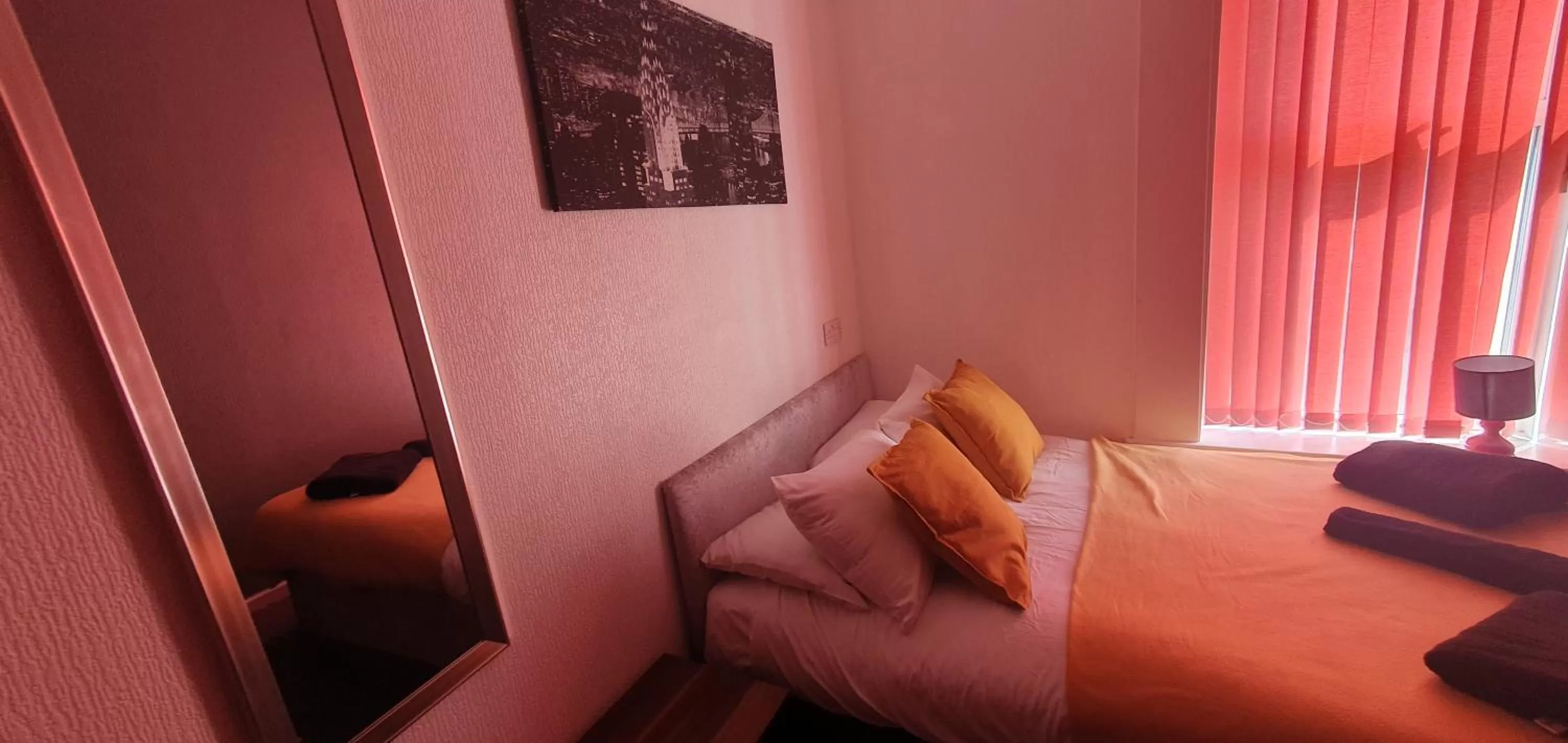 Bed in Palm Beach Hotel by the Sea