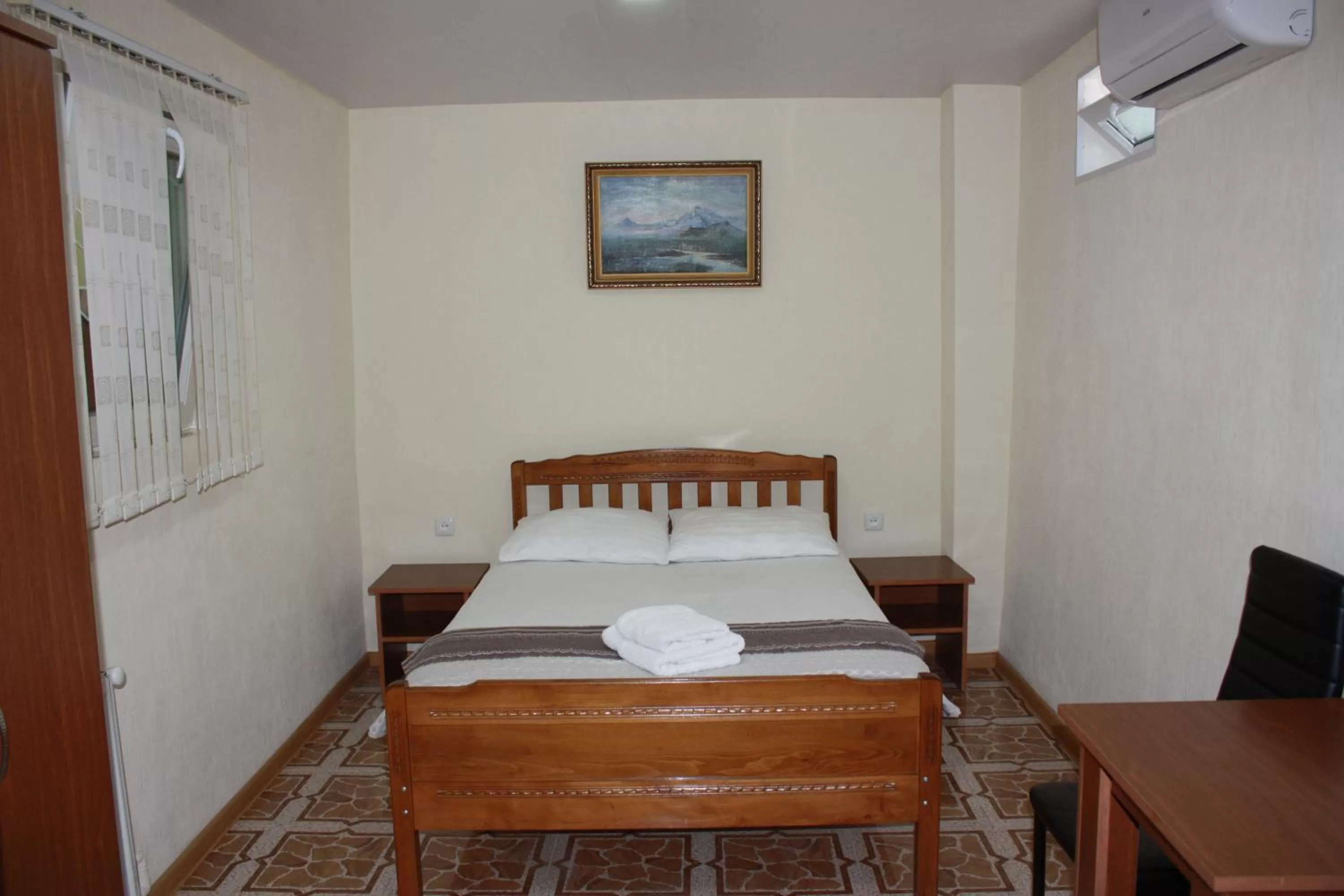 Living room, Bed in Paradise Hotel