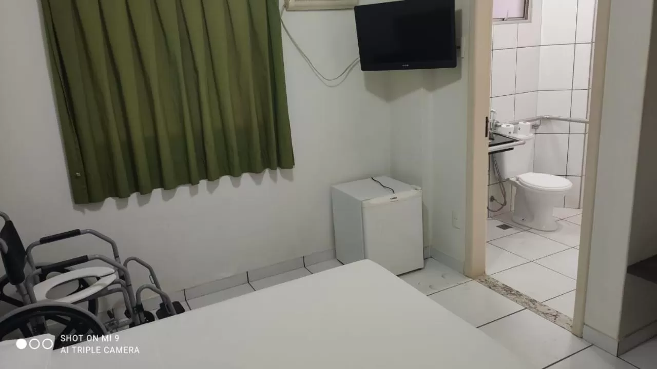 Bedroom, TV/Entertainment Center in Rametta Hotel