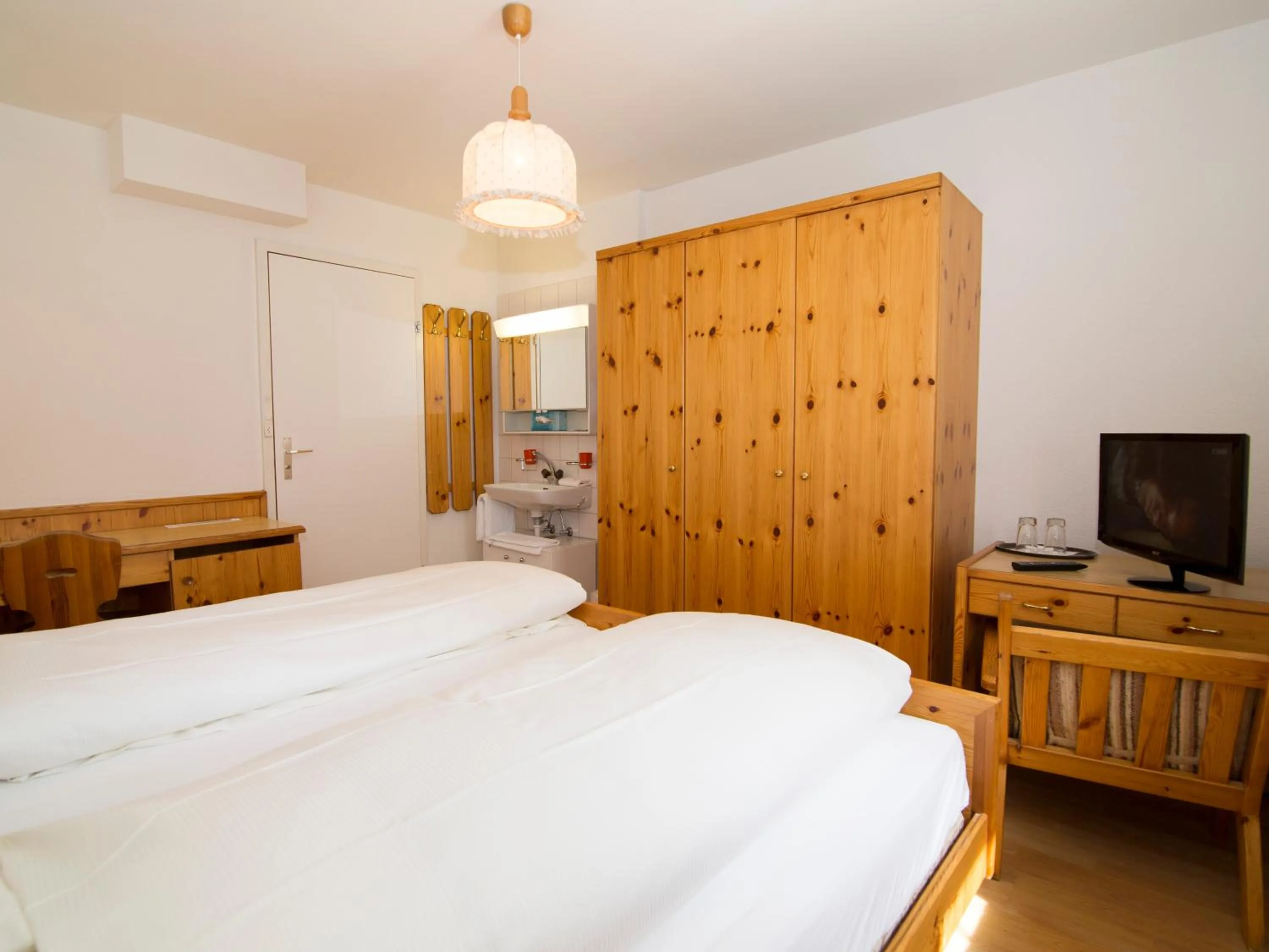 Photo of the whole room, Bed in Hotel Dischma